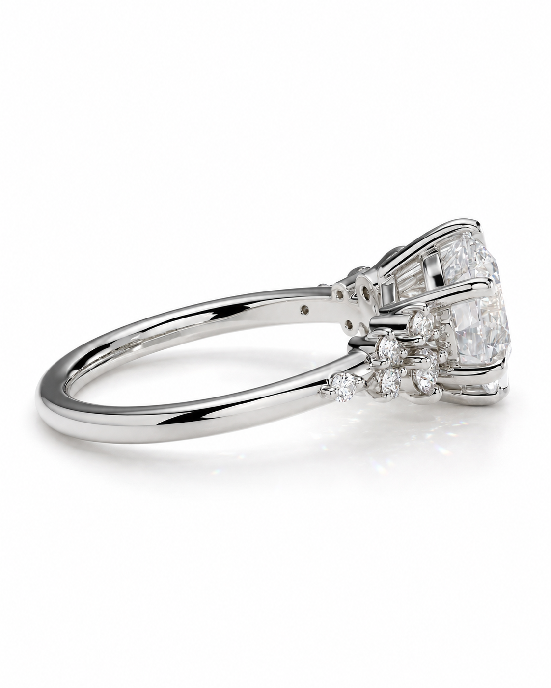 color_925_SIL,color_935_ARG,color_10K_WG, color_14K_WG &&A silver-toned diamond ring with a large oval center stone and smaller baguette and round diamonds along the band, shown on a clean white background.