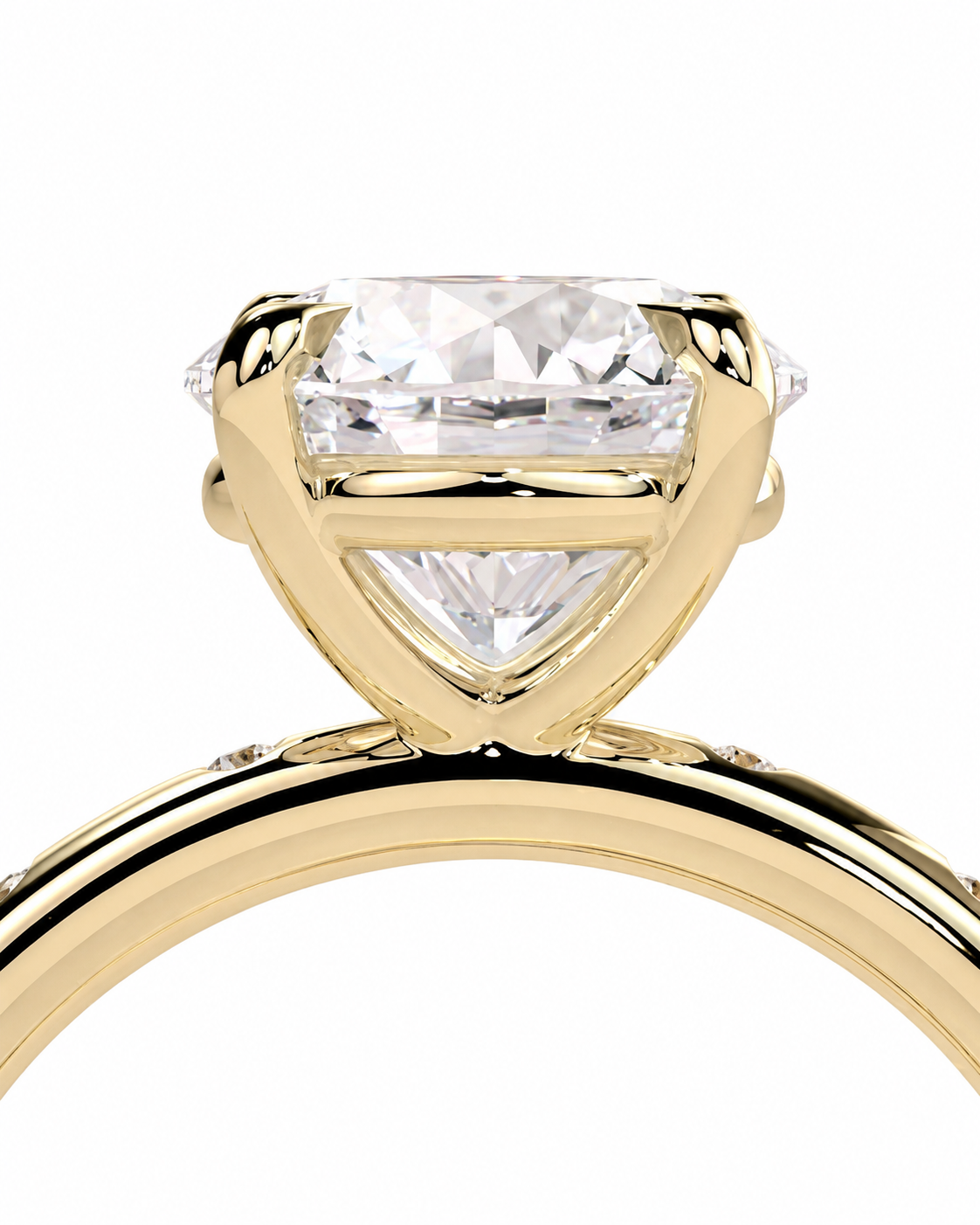 color_10K_YG, color_14K_YG &&A close-up shot of a yellow gold ring featuring a large, brilliant-cut clear gemstone in a triangular prong setting, shown against a solid white background.