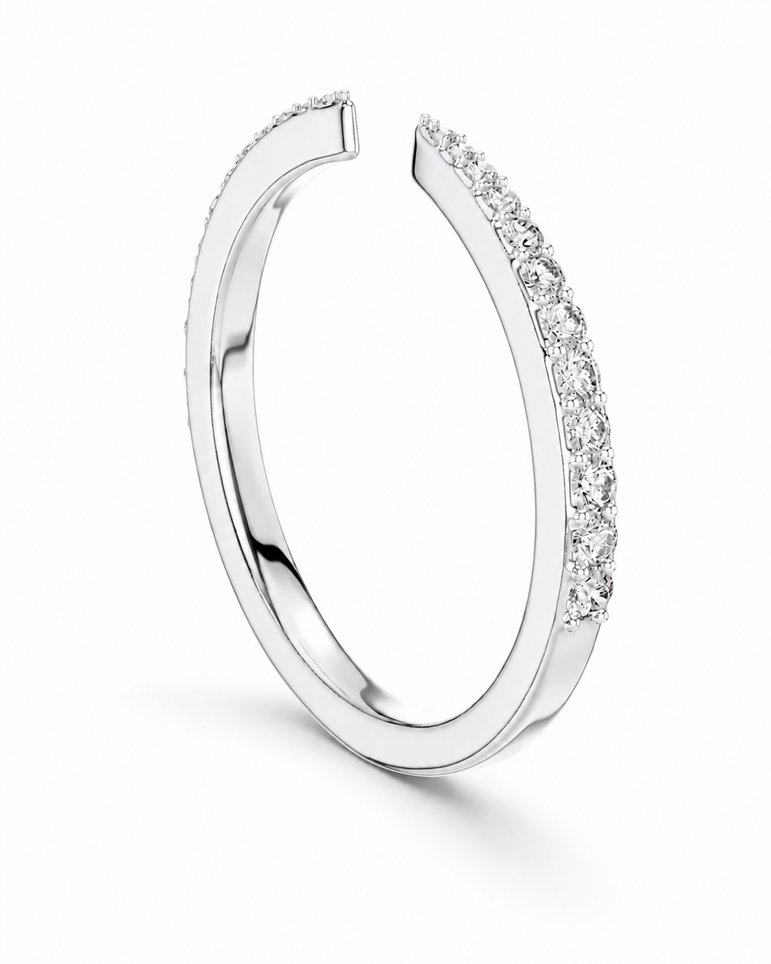 color_925_SIL,color_935_ARG,color_10K_WG, color_14K_WG &&A polished silver-tone open cuff ring featuring a pavé-set row of clear stones along one curved segment, shown on a clean white background.