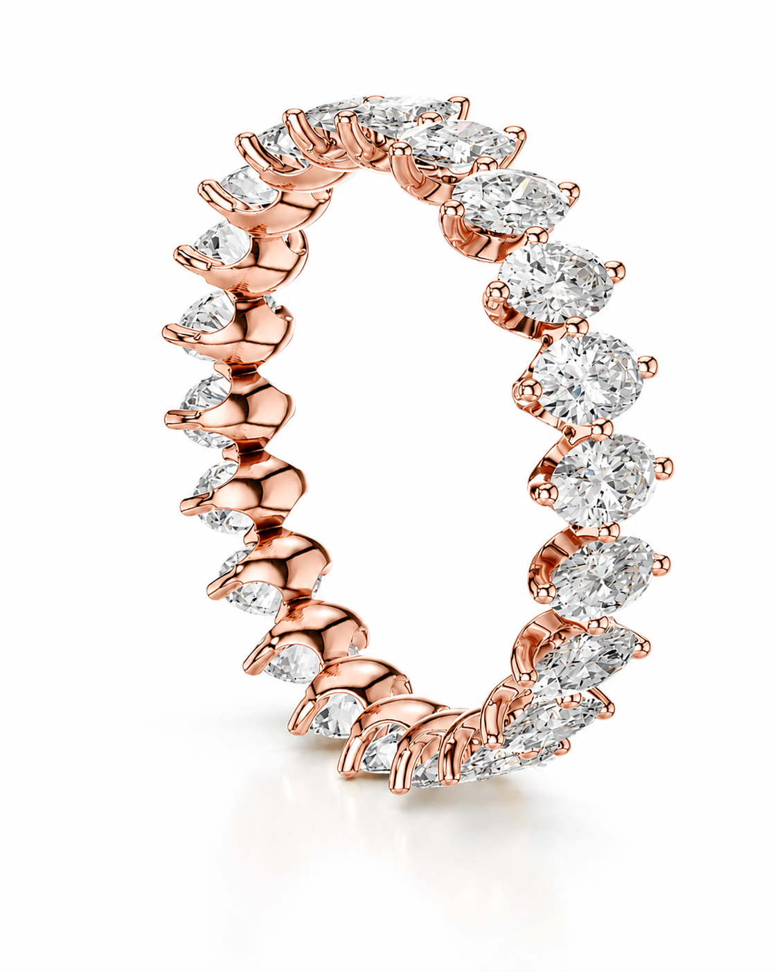 color_10K_RG, color_14K_RG &&A rose gold eternity ring featuring a continuous row of marquise-cut clear gemstones in a prong setting, shown on a clean white background.