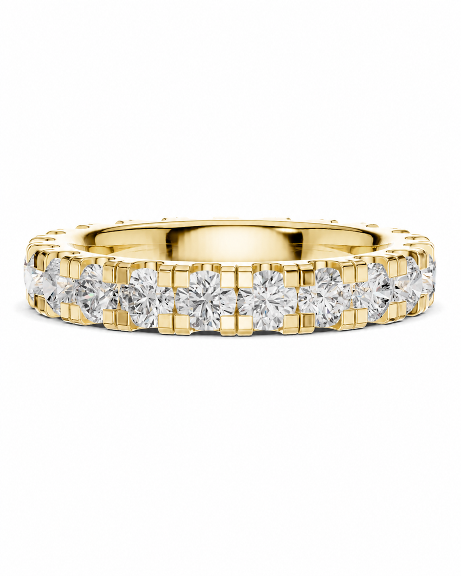 color_10K_YG, color_14K_YG &&A yellow gold eternity ring featuring a continuous row of round brilliant-cut diamonds in a prong setting, shown against a plain white background.