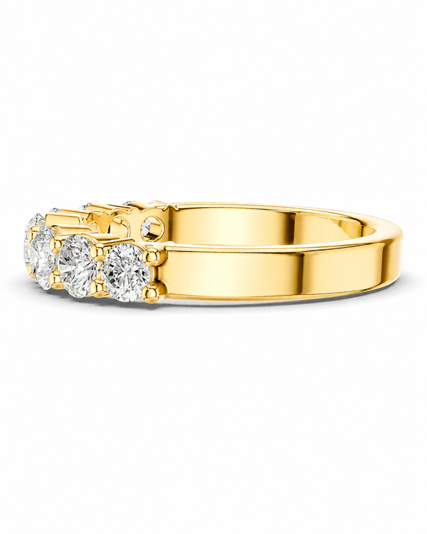 color_10K_YG, color_14K_YG &&A yellow gold ring featuring three round-cut clear gemstones in a row, photographed on a clean white background.