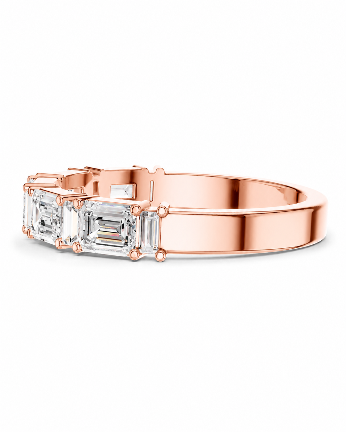 color_10K_RG, color_14K_RG &&A rose gold ring featuring a row of clear baguette and round-cut gemstones, shown on a clean white background.