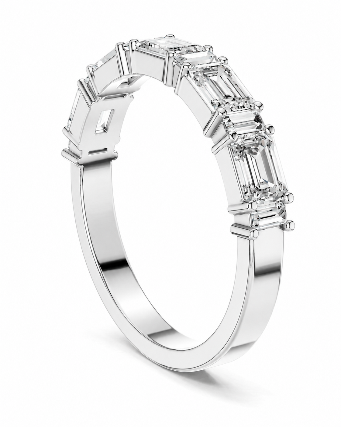 color_925_SIL,color_935_ARG,color_10K_WG, color_14K_WG &&A silver-colored diamond ring featuring a row of baguette-cut diamonds set in a polished band, shown on a clean white background.