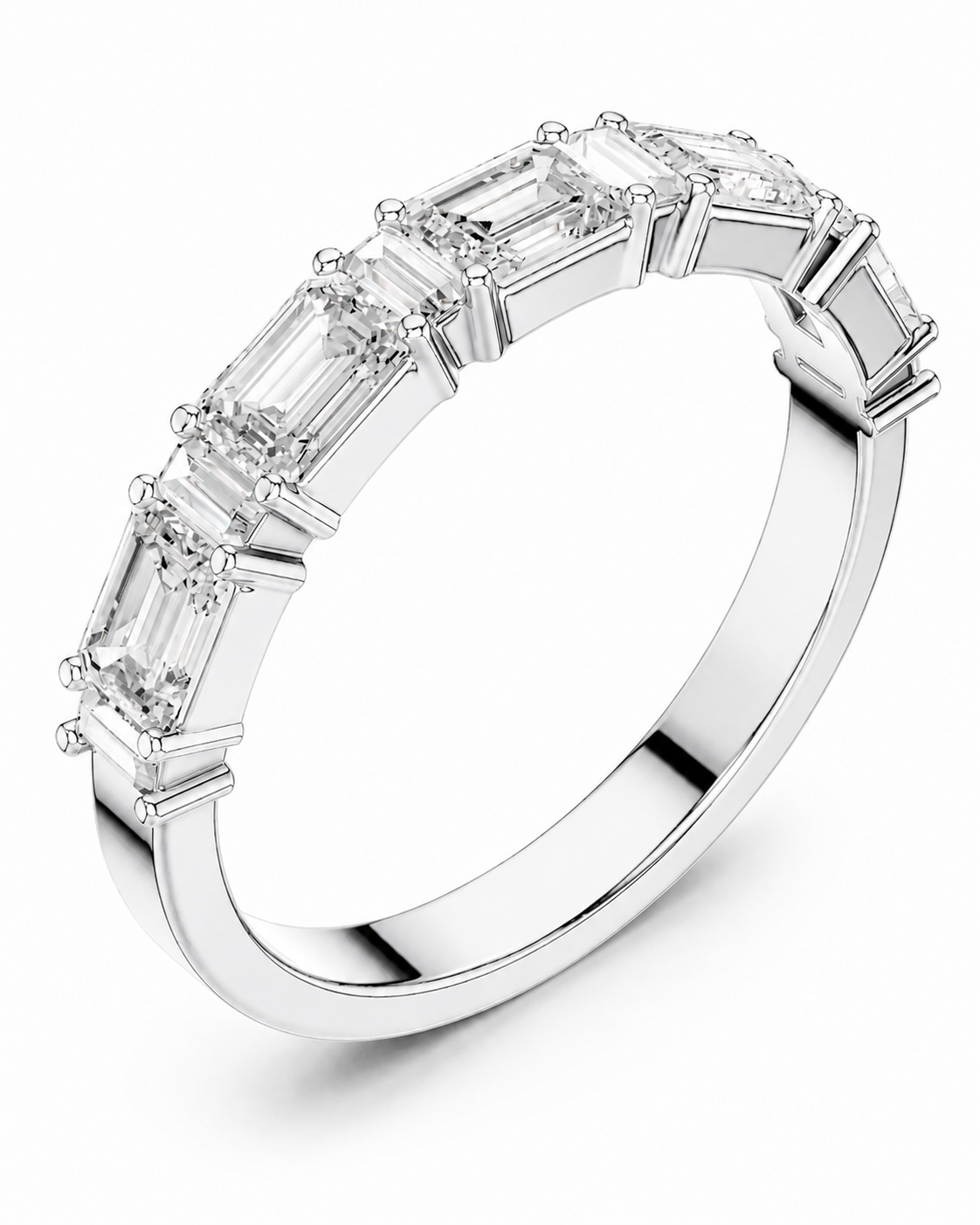 color_925_SIL,color_935_ARG,color_10K_WG, color_14K_WG &&A silver band ring featuring a row of baguette-cut clear gemstones in a prong setting, shown on a clean white background.