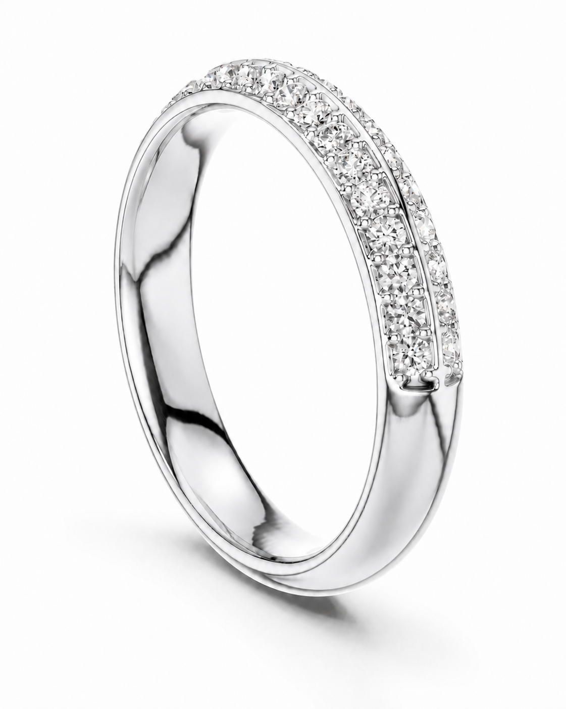 color_925_SIL,color_935_ARG,color_10K_WG, color_14K_WG &&A polished silver-tone ring band featuring a double row of sparkling clear pavé-set stones along the upper curve, shown on a clean white background.