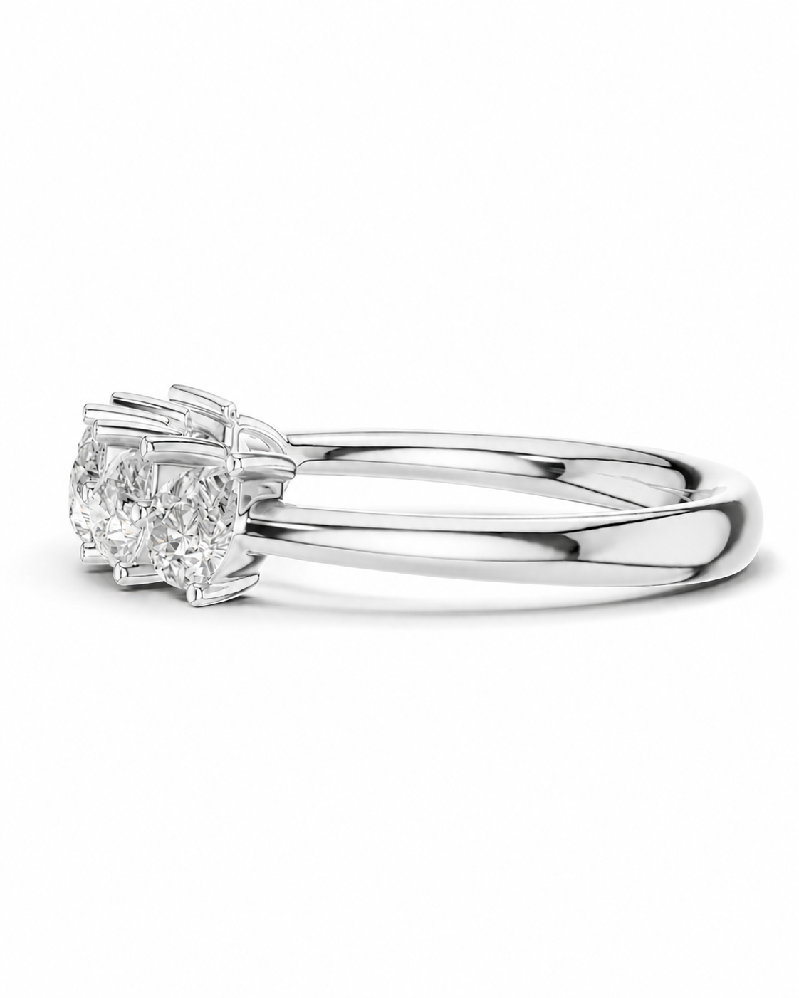 color_925_SIL,color_935_ARG,color_10K_WG, color_14K_WG &&A radiant cut diamond engagement ring in a polished silver-colored metal setting, shown from a side profile view against a clean white background.
