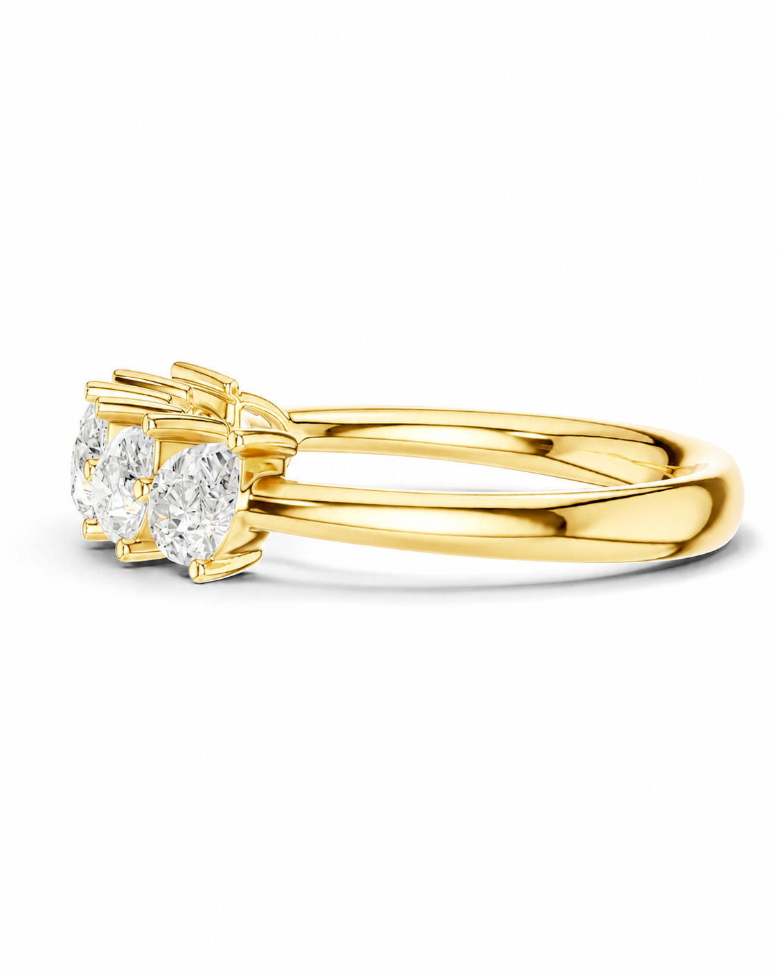 color_10K_YG, color_14K_YG &&A yellow gold ring featuring three round-cut clear gemstones in a prong setting, shown on a clean white background.