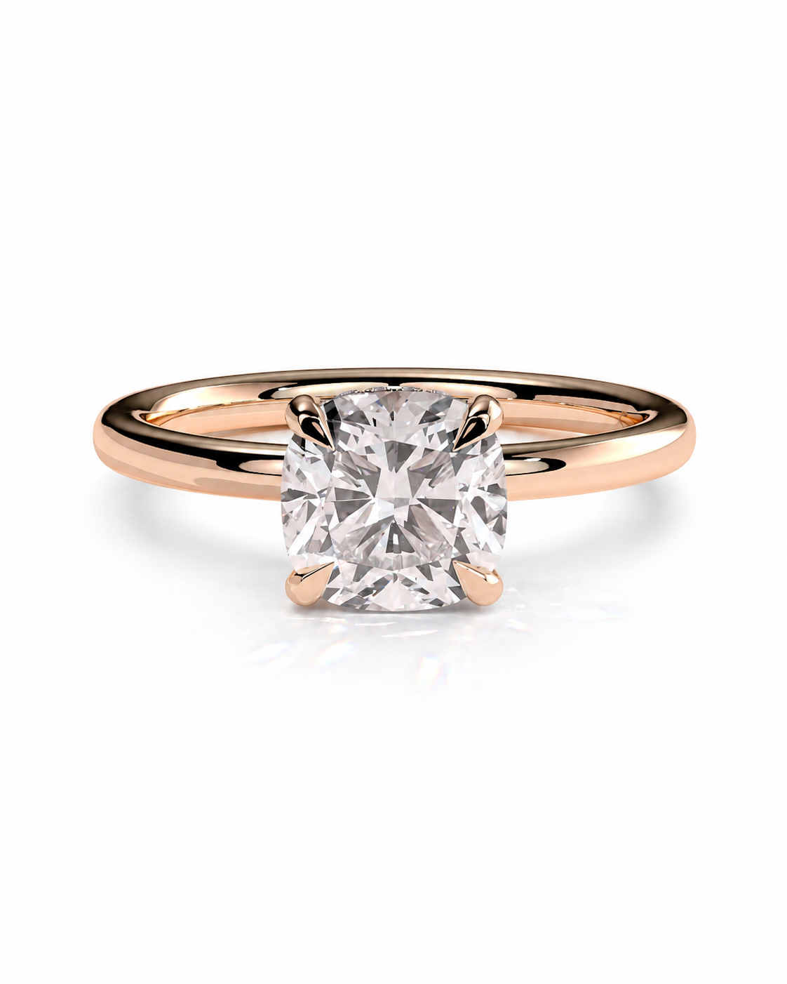 color_10K_RG, color_14K_RG &&A radiant cut diamond engagement ring with a rose gold band, shown on a clean white background with a soft reflection.