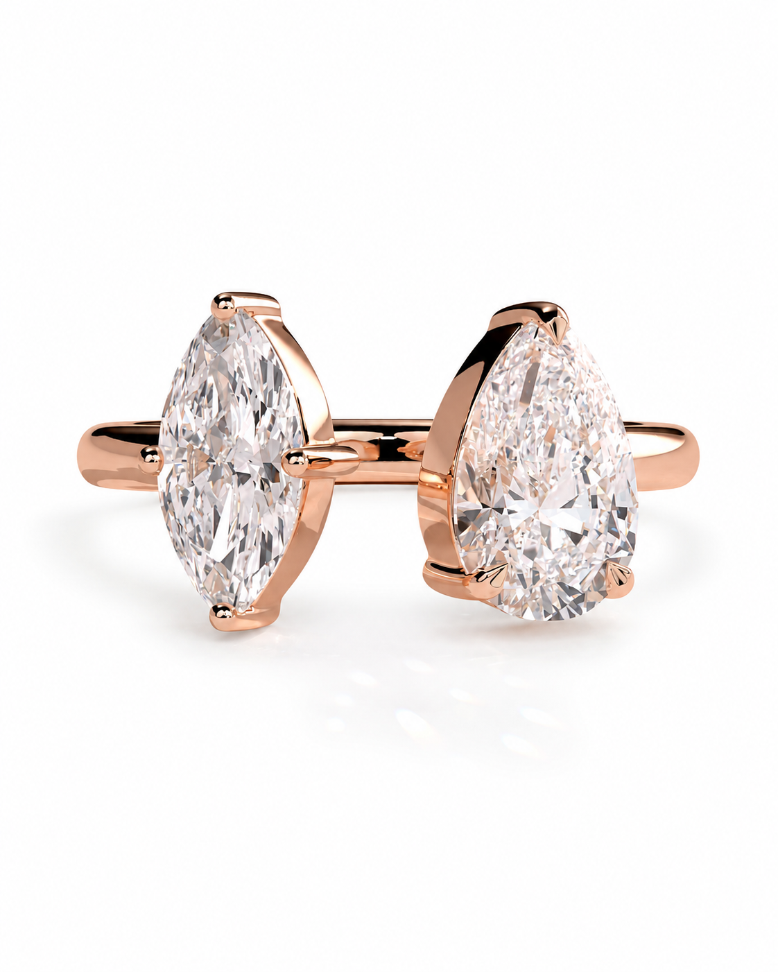 color_10K_RG, color_14K_RG &&A pair of rose gold engagement rings with marquise and pear-cut diamonds, displayed on a clean white background.