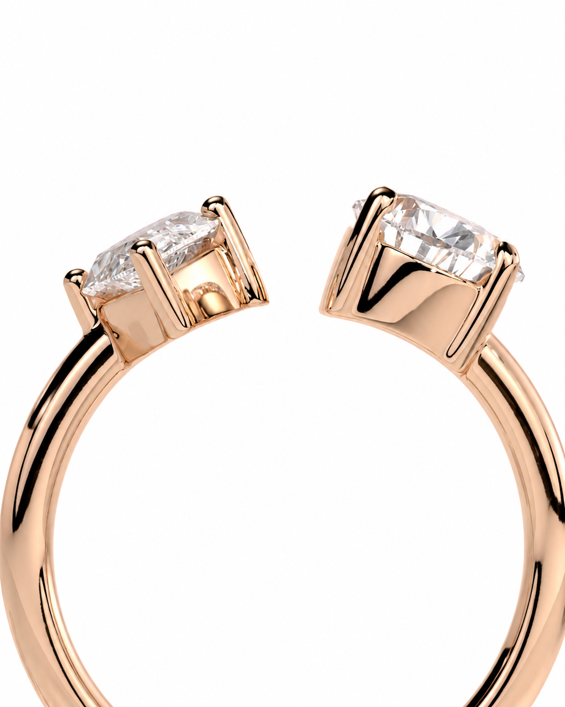 color_10K_RG, color_14K_RG &&Rose gold ring with a marquise-cut clear gemstone in a four-prong setting, shown from the side against a white background.
