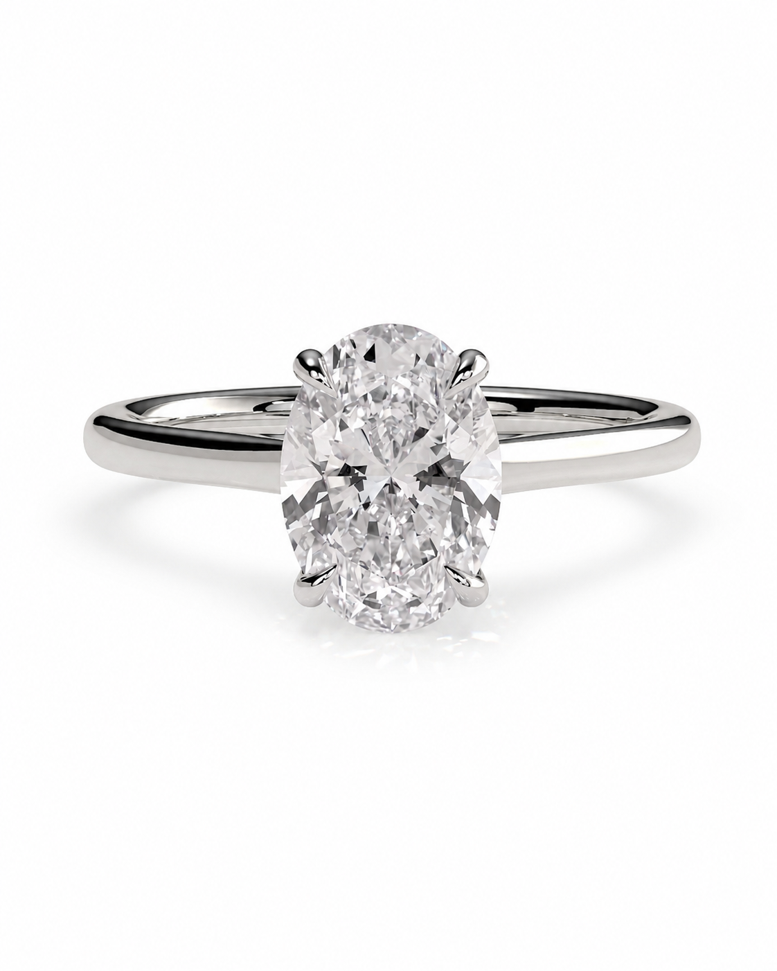 color_925_SIL,color_935_ARG,color_10K_WG, color_14K_WG &&An oval-cut diamond engagement ring with a polished silver-colored band, shown on a clean white background.