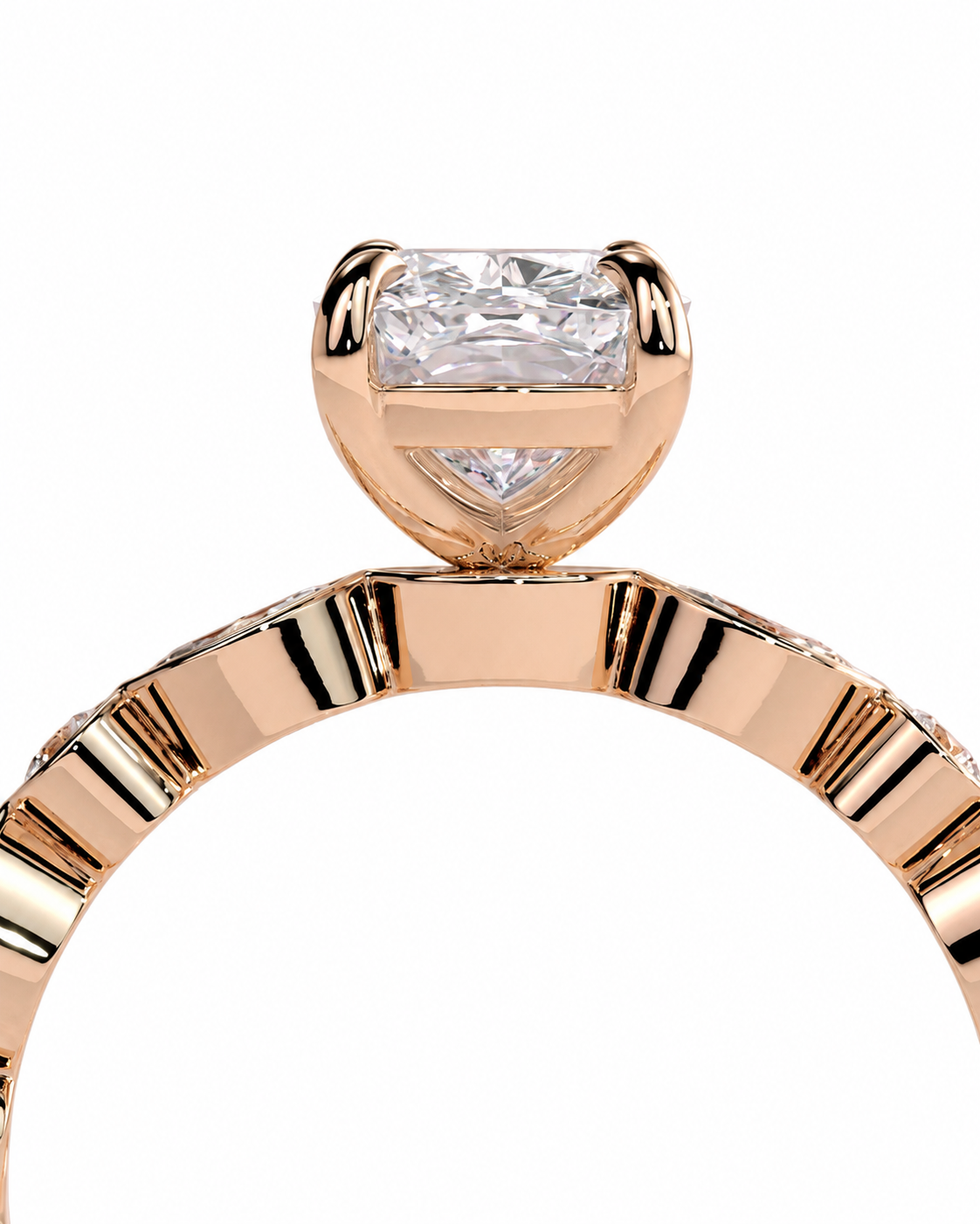 color_10K_RG, color_14K_RG &&
Rose gold solitaire engagement ring with a princess-cut diamond center stone and a smaller triangular diamond accent below, shown on a white background.