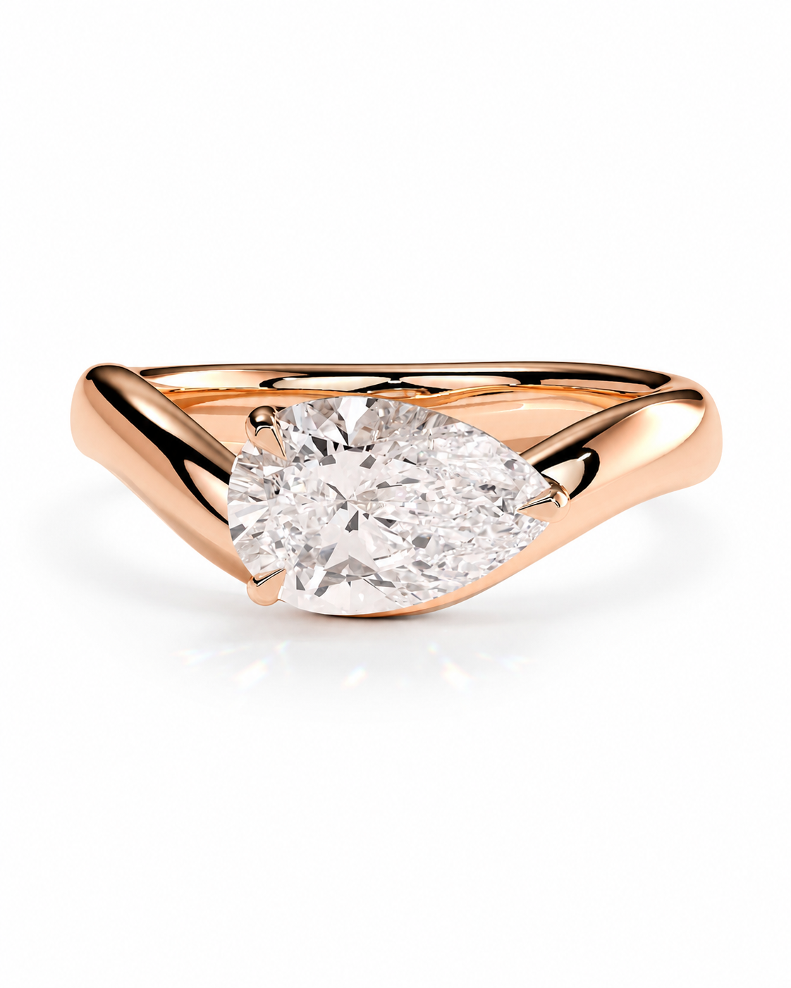 color_10K_RG, color_14K_RG &&A rose gold solitaire ring featuring a large pear-cut diamond, set against a clean white background.