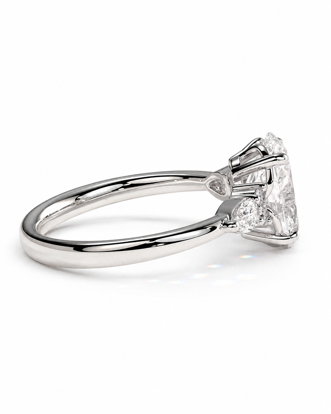 color_925_SIL,color_935_ARG,color_10K_WG, color_14K_WG &&A silver diamond ring with a large round brilliant-cut center stone and smaller accent diamonds on a clean white background.