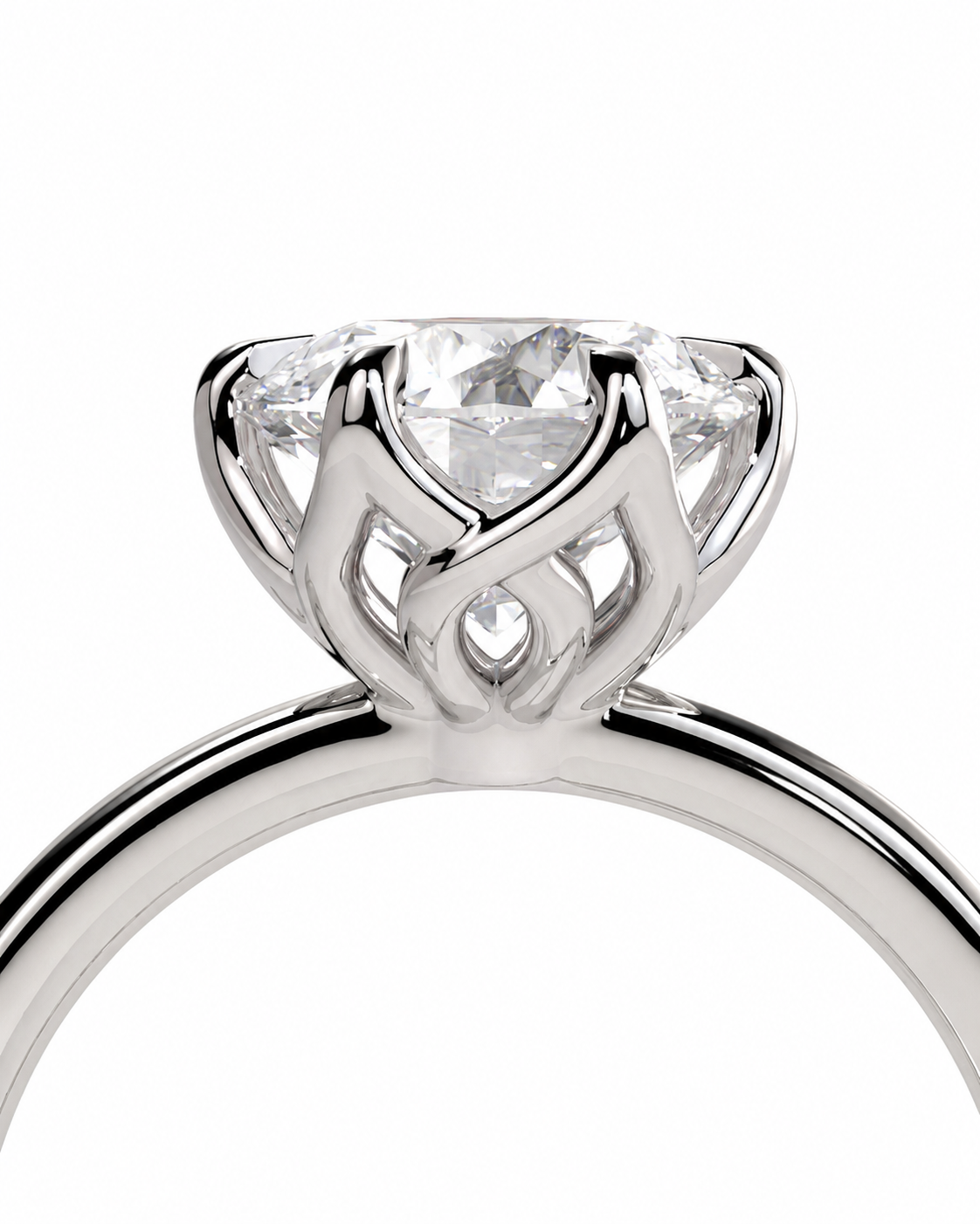 color_925_SIL,color_935_ARG,color_10K_WG, color_14K_WG &&A close-up studio shot of a silver-toned solitaire engagement ring with a round brilliant-cut diamond in a decorative openwork crown setting, on a plain white background.