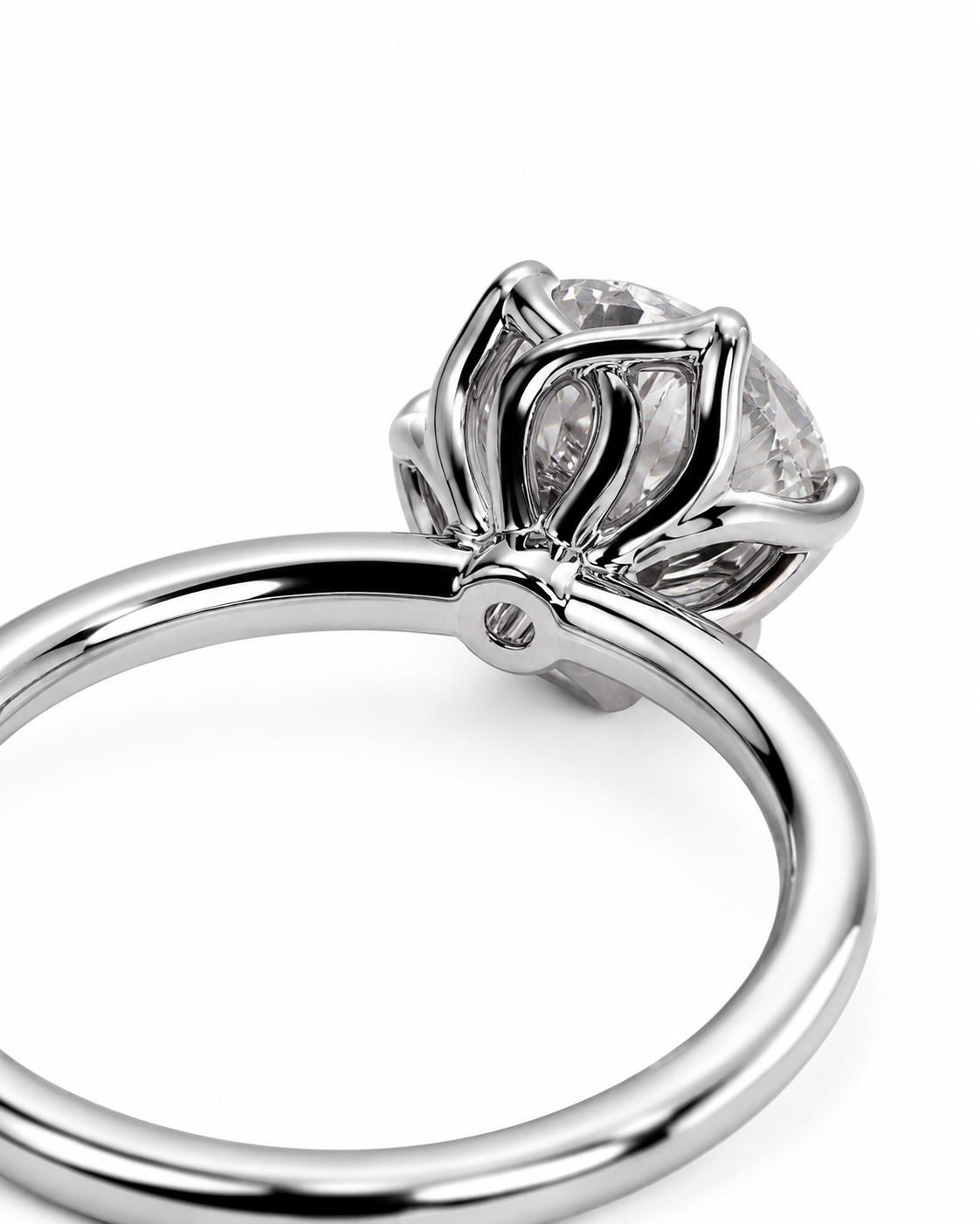 color_925_SIL,color_935_ARG,color_10K_WG, color_14K_WG &&A close-up studio shot of a silver-toned ring with a crown-like setting holding clear gemstones, shown against a plain white background.