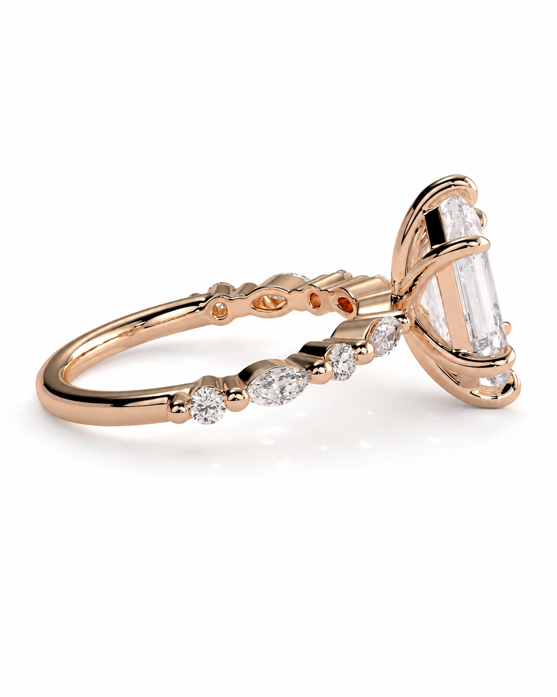 color_10K_RG, color_14K_RG &&A rose gold ring featuring a large baguette-cut clear center stone and a row of smaller round-cut stones along the band, shown on a clean white background.