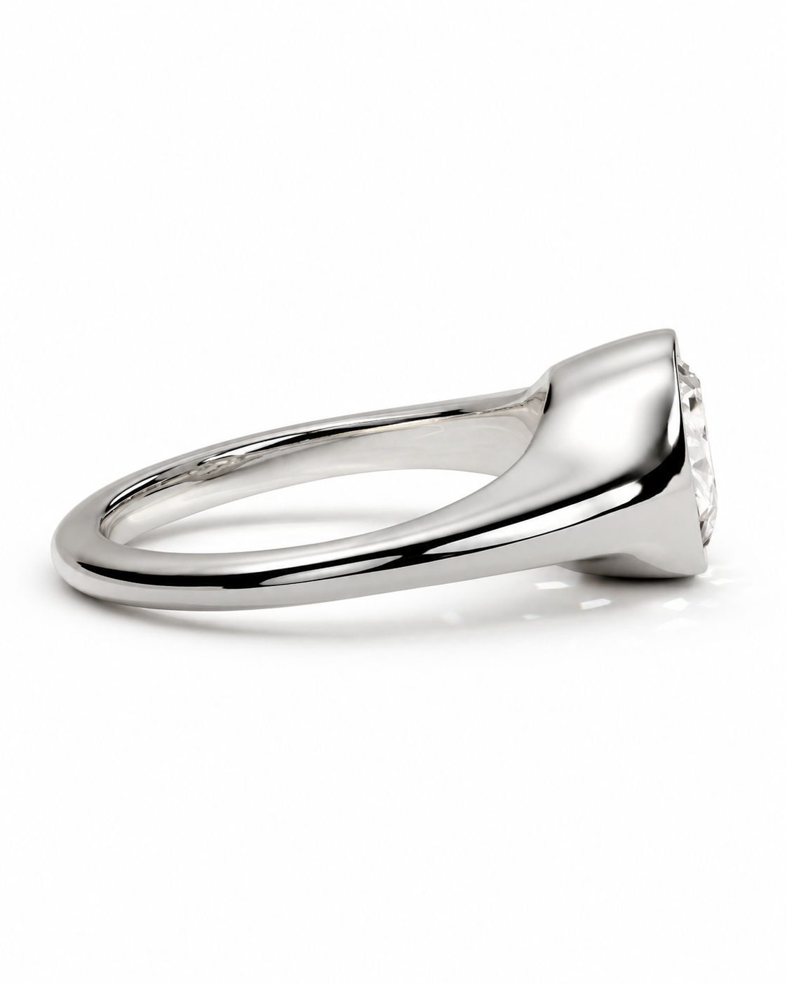 color_925_SIL,color_935_ARG,color_10K_WG, color_14K_WG &&A polished silver ring with a wide, rounded band and a triangular bezel setting holding a clear gemstone, shown on a white background.