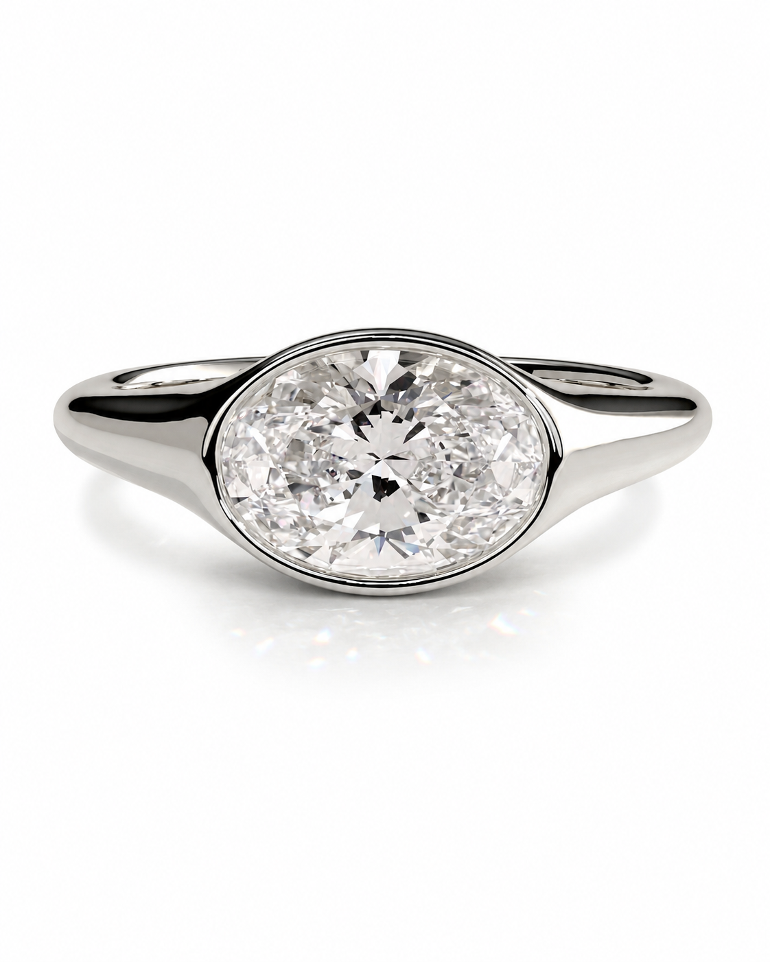 color_925_SIL,color_935_ARG,color_10K_WG, color_14K_WG &&An oval diamond ring with a polished silver-colored band, shown on a clean white background.