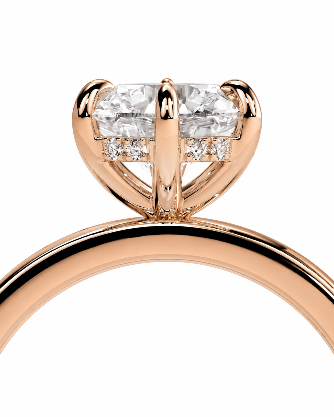 color_10K_RG, color_14K_RG &&Close-up of a rose gold ring with a large oval-cut center stone and small side stones, shown on a plain white background.