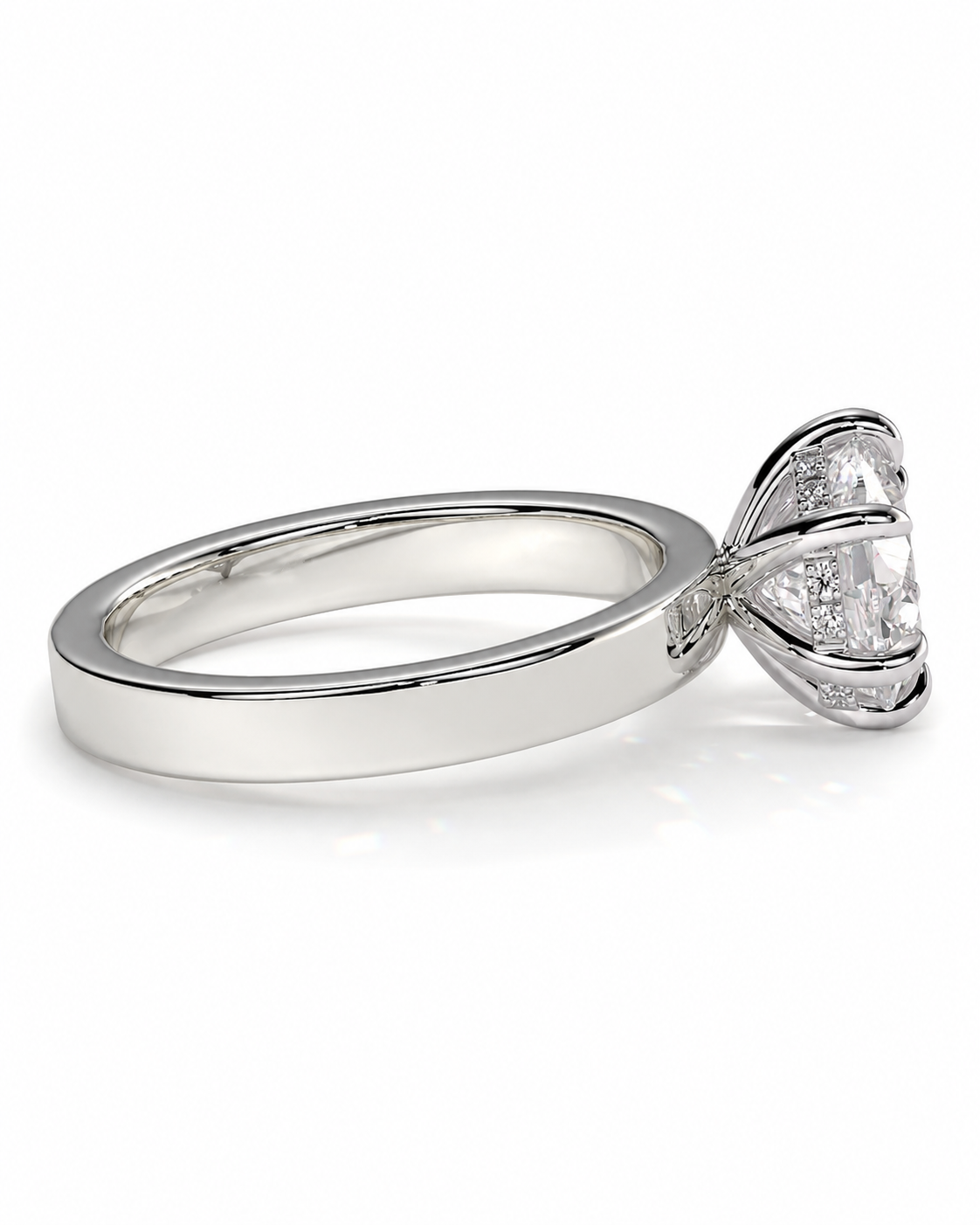 color_925_SIL,color_935_ARG,color_10K_WG, color_14K_WG &&A silver-toned solitaire engagement ring with a clear round-cut gemstone in a prong setting, shown on a clean white background.