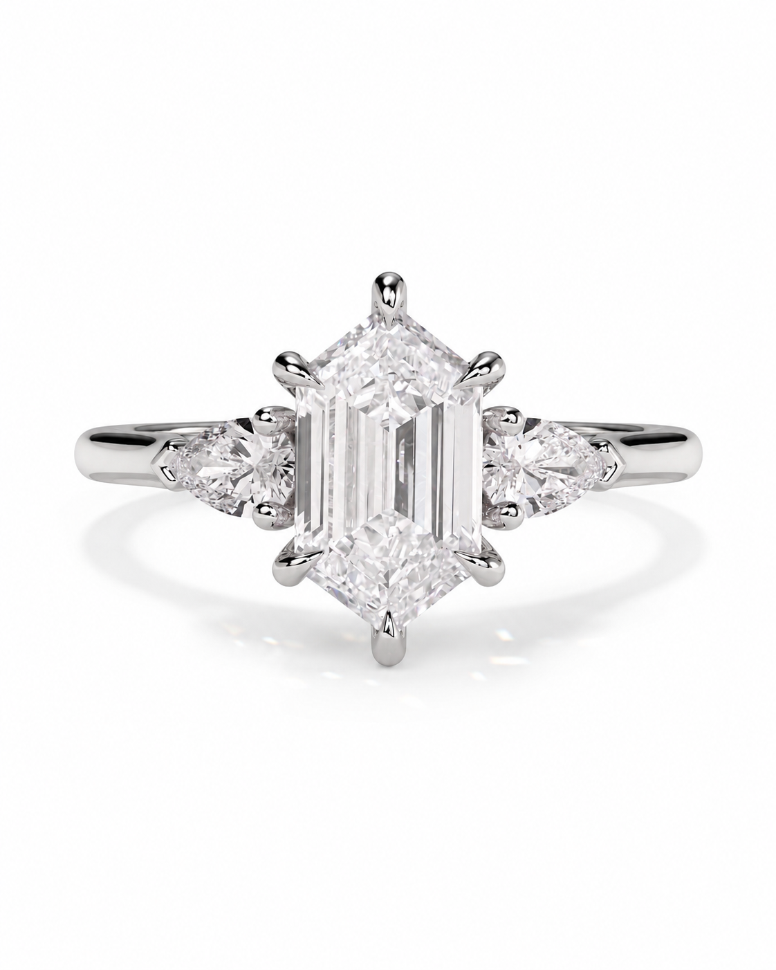 color_925_SIL,color_935_ARG,color_10K_WG, color_14K_WG &&An emerald-cut diamond ring with a silver-toned band and smaller marquise-cut diamonds on either side, shown on a clean white background.