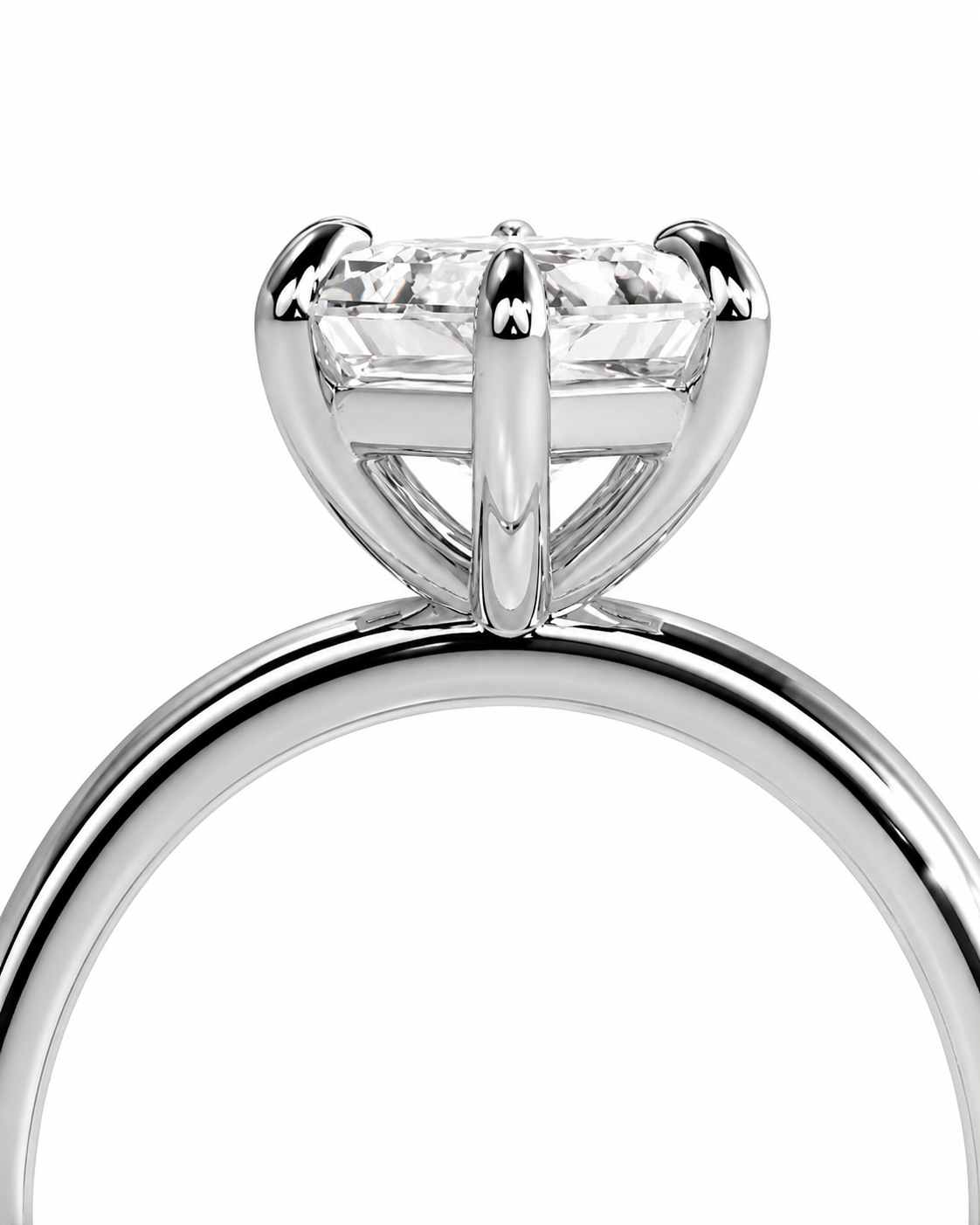 color_925_SIL,color_935_ARG,color_10K_WG, color_14K_WG &&
A close-up studio shot of a silver-toned solitaire engagement ring with a round brilliant-cut diamond set in a four-prong setting, shown against a plain white background.