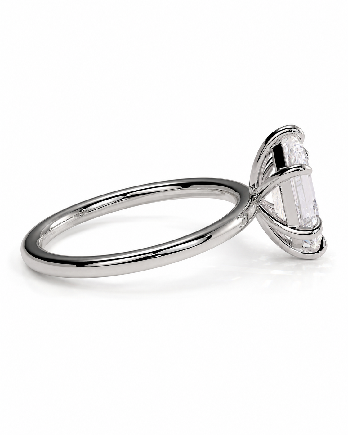 color_925_SIL,color_935_ARG,color_10K_WG, color_14K_WG &&
A silver-toned solitaire ring with a large clear baguette-cut gemstone in a prong setting, shown on a clean white background.