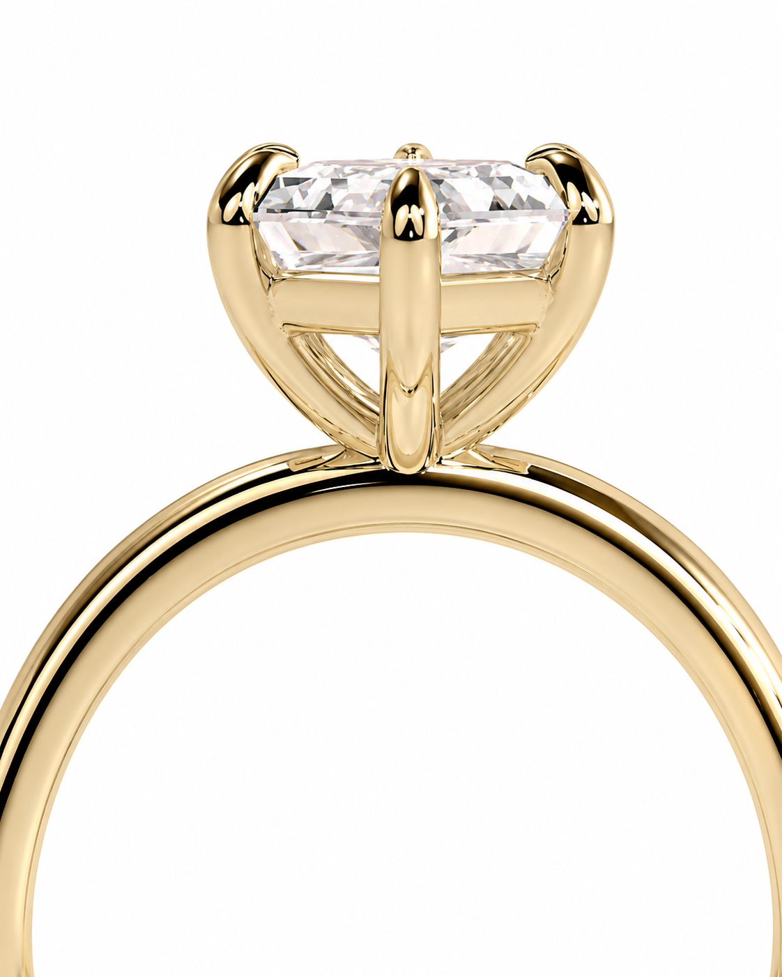 color_10K_YG, color_14K_YG &&
A close-up of a yellow gold ring with a clear rectangular gemstone in a four-prong setting, shown against a plain white background.