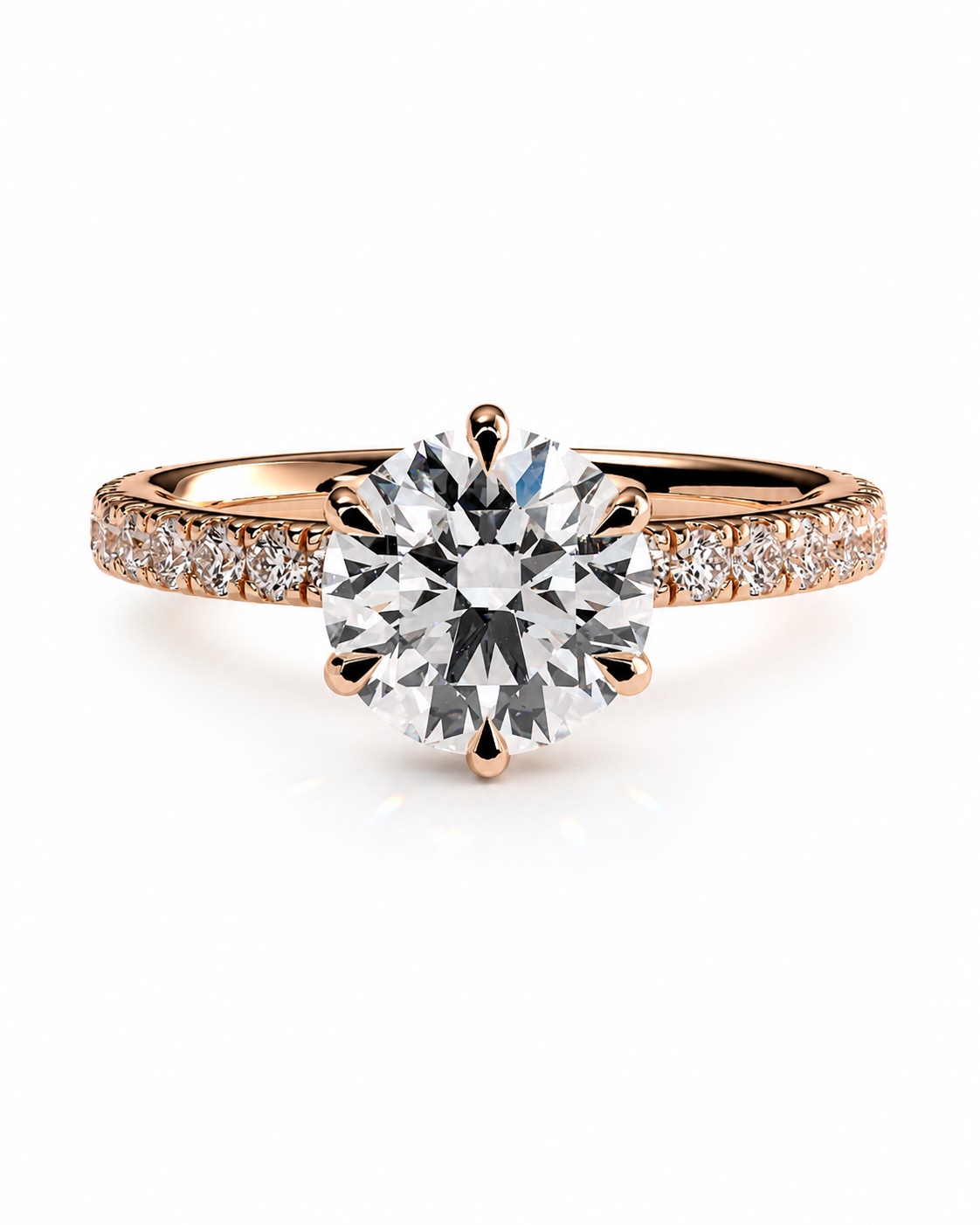 color_10K_RG, color_14K_RG &&A rose gold engagement ring featuring a large round-cut center stone in a six-prong setting, with a pavé band accented by small round stones, shown on a clean white background.