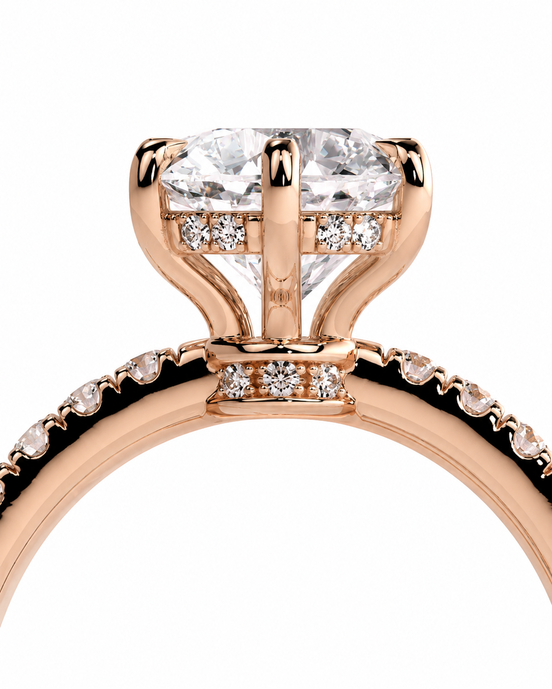color_10K_RG, color_14K_RG &&Rose gold ring with a large oval-cut clear center stone and small accent stones, shown in a close-up studio shot on a white background.