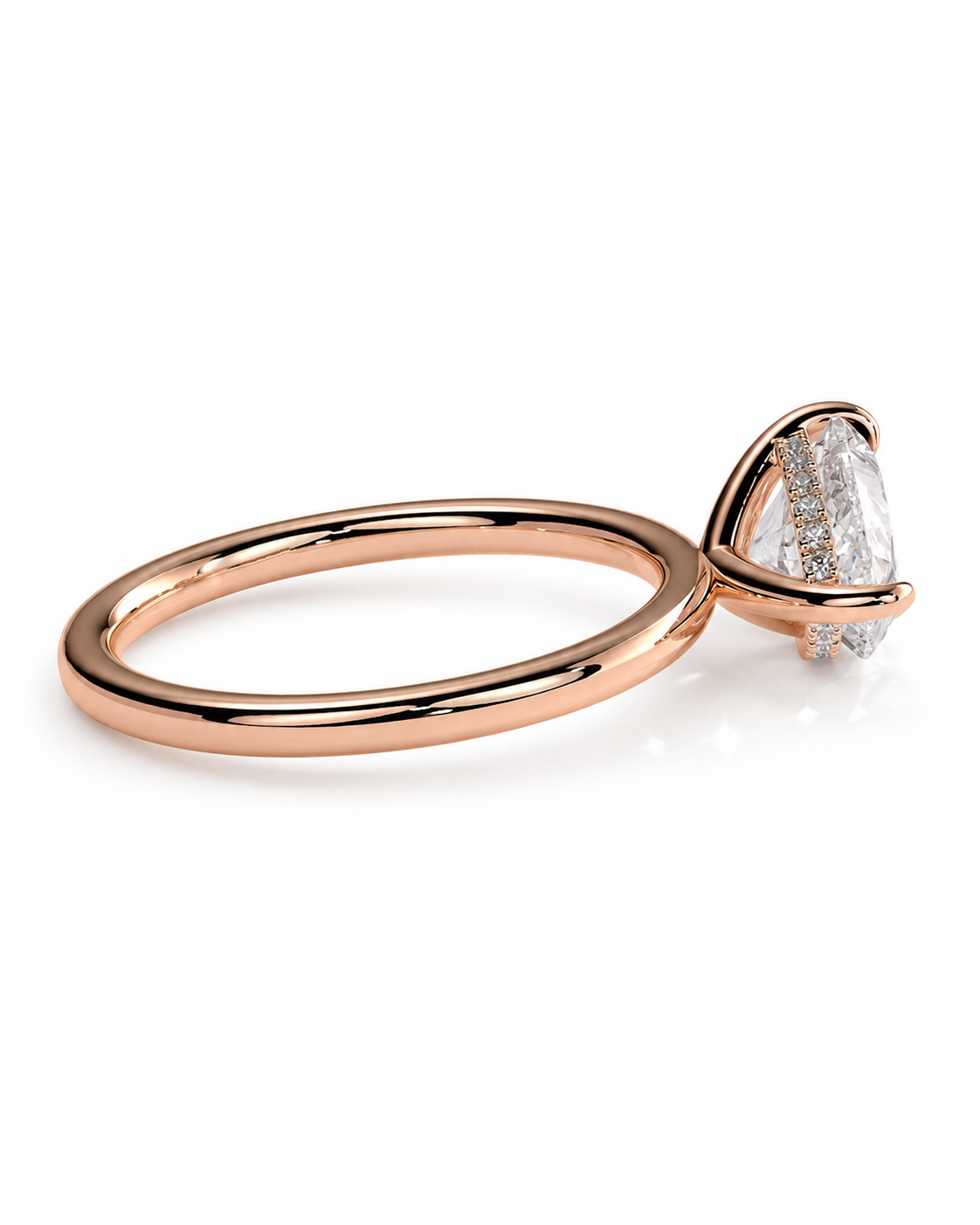 color_10K_RG, color_14K_RG &&A rose gold ring with a wide band and a triangular bezel setting holding a clear marquise-cut gemstone, shown on a white background.