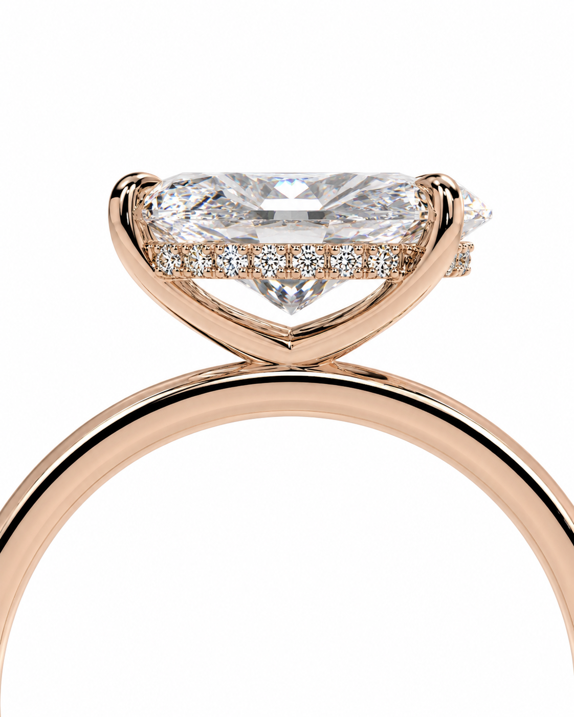 color_10K_RG, color_14K_RG &&Rose gold diamond ring with a large marquise-cut center stone and small pavé diamonds along the band, shown on a white background.