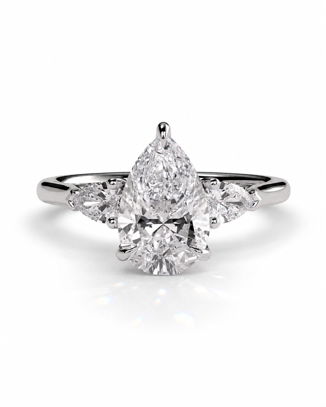 color_925_SIL,color_935_ARG,color_10K_WG, color_14K_WG &&A pear-cut diamond engagement ring with marquise and round diamonds on a polished silver-colored band, set against a clean white background.