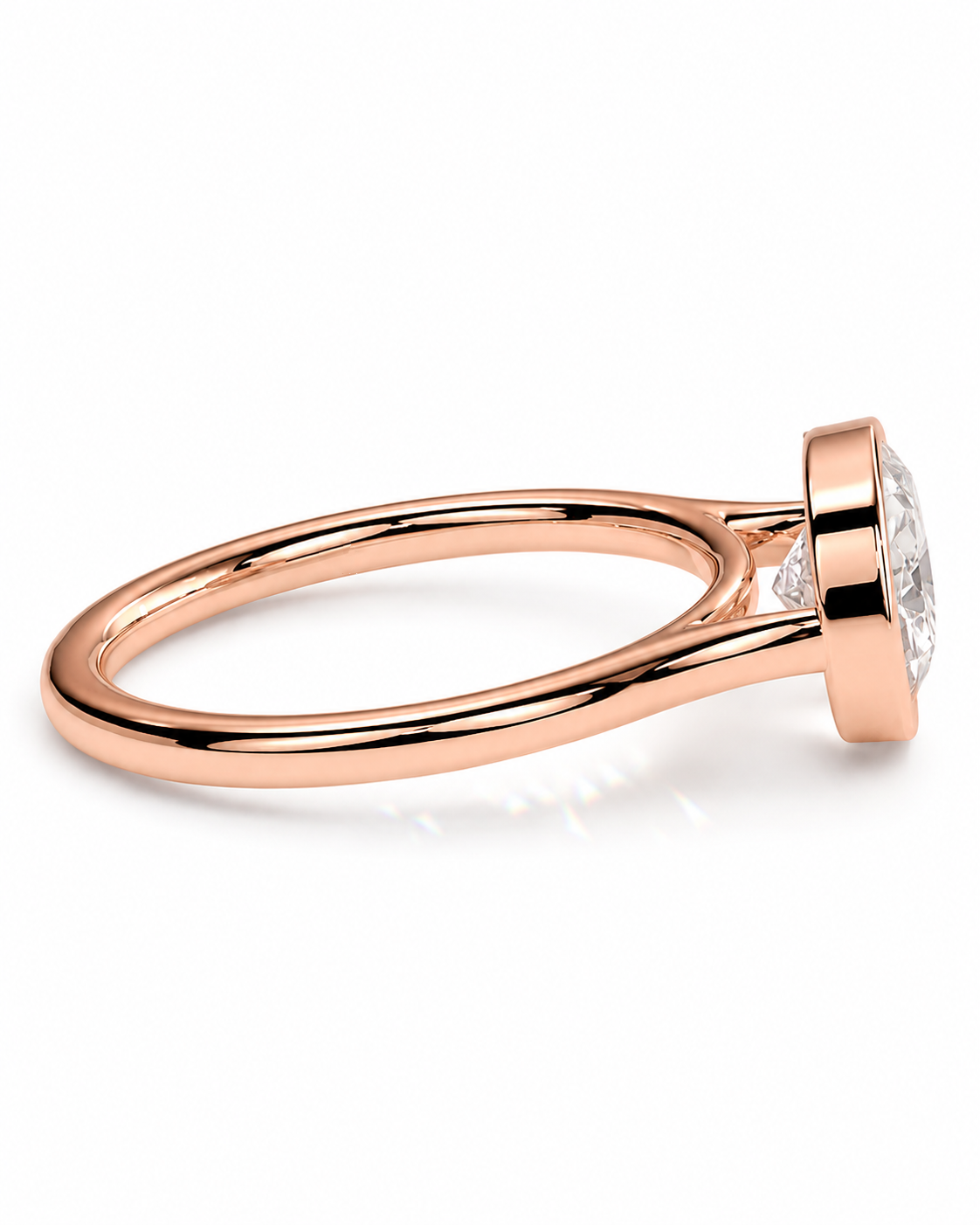 color_10K_RG, color_14K_RG &&A rose gold engagement ring featuring a round brilliant-cut diamond and a smaller accent diamond in a split-shank setting, shown on a clean white background.