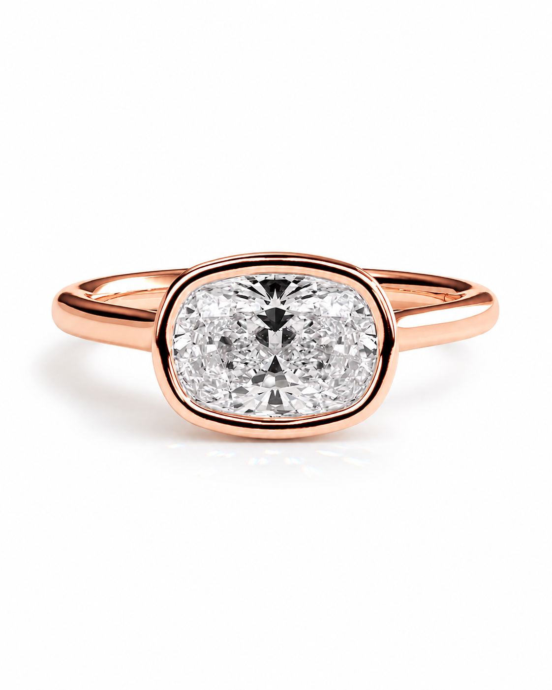 color_10K_RG, color_14K_RG &&A rose gold engagement ring featuring a cushion-cut diamond center stone in an oval bezel setting, shown on a clean white background.