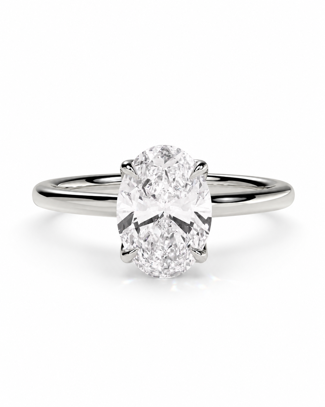 color_925_SIL,color_935_ARG,color_10K_WG, color_14K_WG &&An oval diamond engagement ring with a polished silver-colored band, shown on a clean white background.