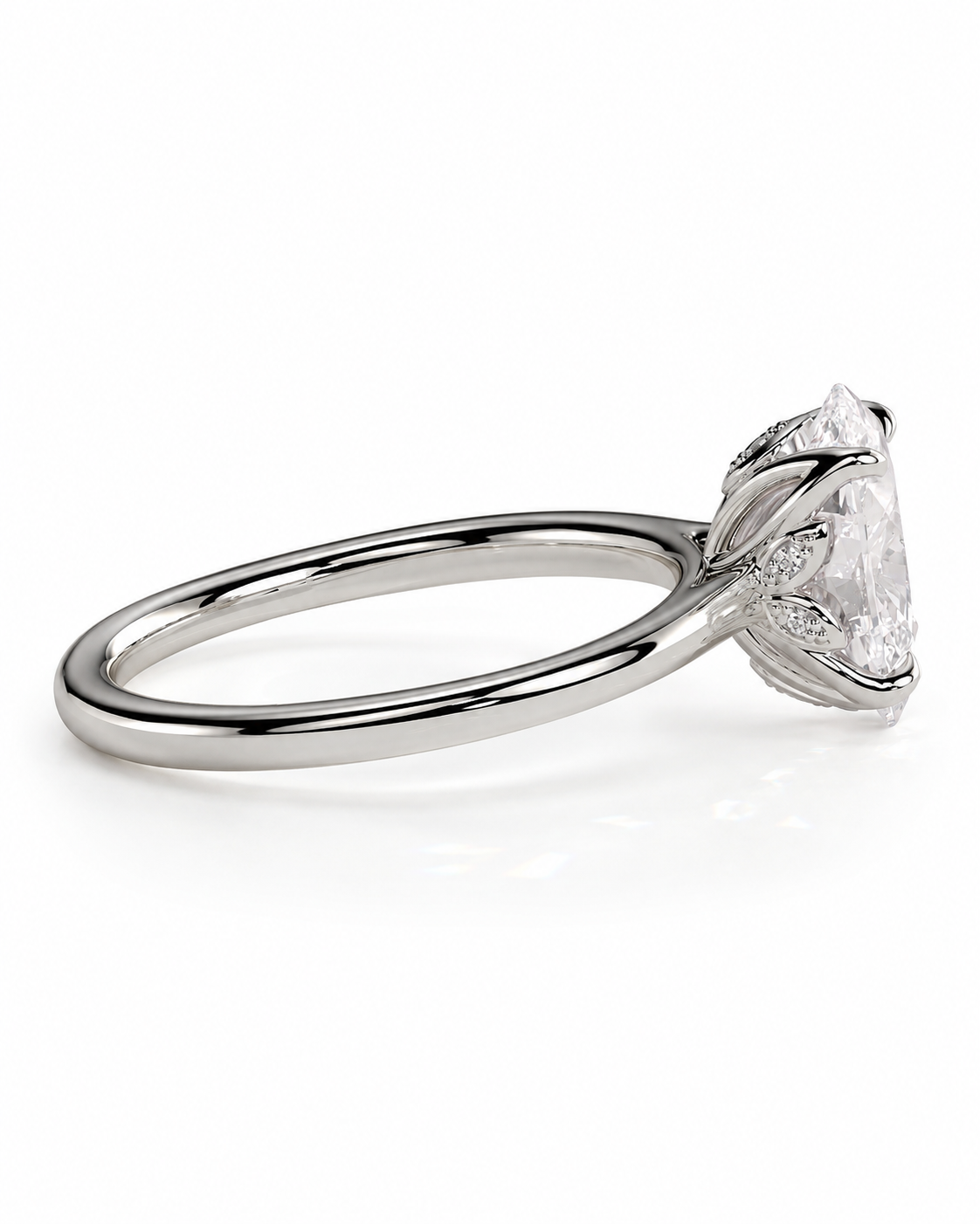 color_925_SIL,color_935_ARG,color_10K_WG, color_14K_WG &&A silver-toned diamond ring with a marquise-cut center stone and small accent diamonds on the shoulders, shown on a clean white background.