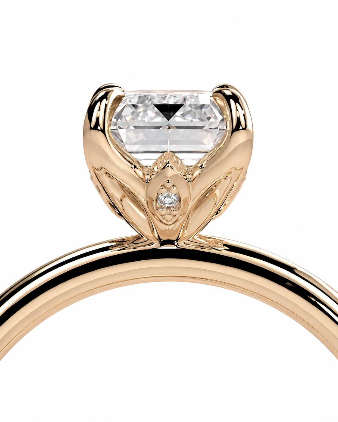 color_10K_RG, color_14K_RG &&A close-up of a rose gold solitaire ring featuring a large rectangular clear gemstone in a prong setting with a small accent diamond on the band, set against a plain white background.
