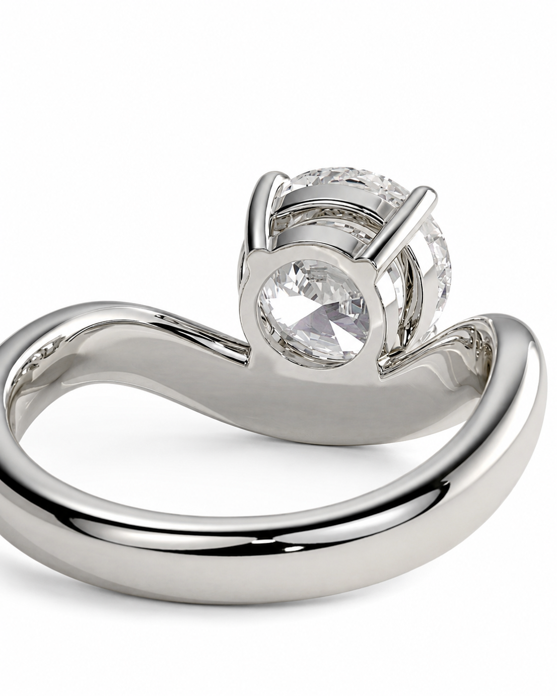 color_925_SIL,color_935_ARG,color_10K_WG, color_14K_WG &&A polished silver-tone solitaire ring featuring a round clear gemstone in a prong setting, shown on a clean white background.
