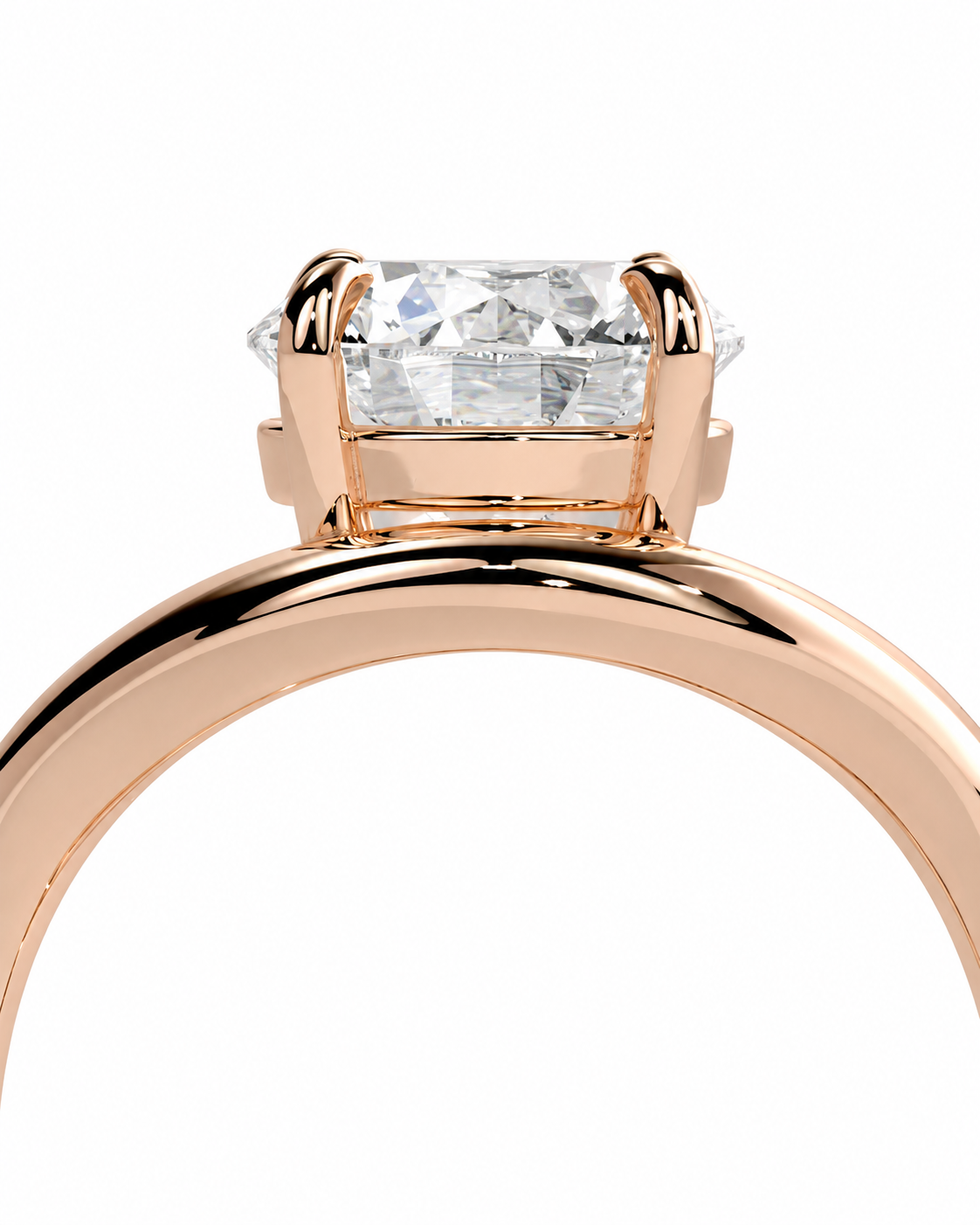 color_10K_RG, color_14K_RG &&A close-up of a rose gold engagement ring featuring a rectangular clear gemstone in a four-prong setting, shown against a solid white background.