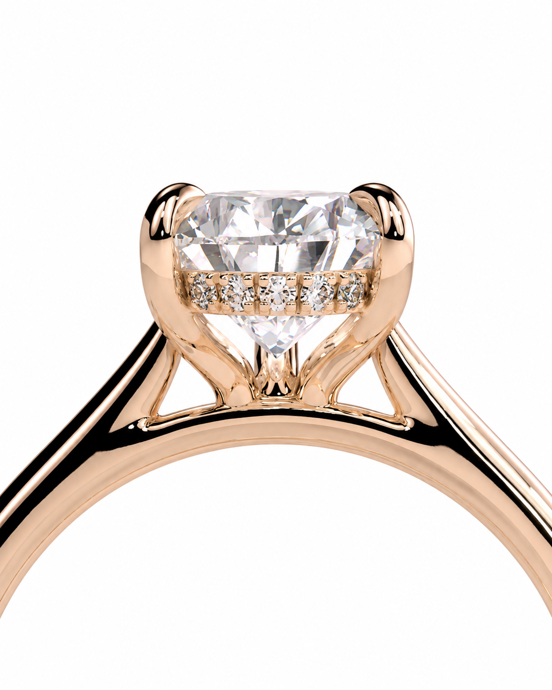 color_10K_RG, color_14K_RG &&A close-up of a rose gold engagement ring featuring a heart-shaped clear center stone and a halo of small round diamonds on a white background.