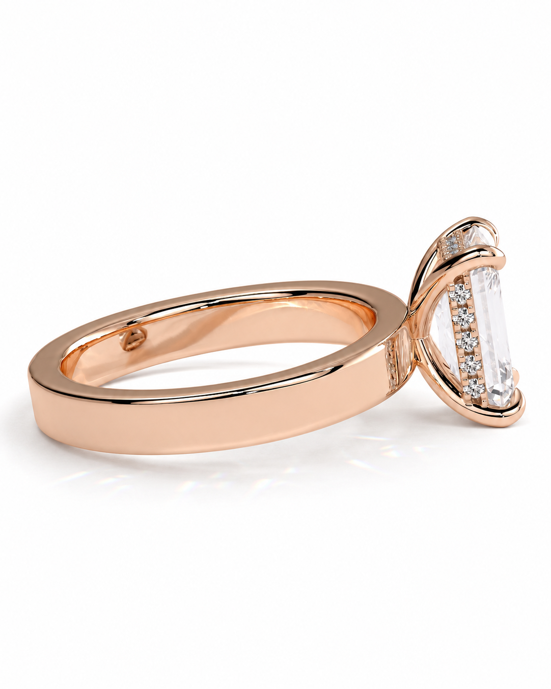 color_10K_RG, color_14K_RG &&A rose gold ring with a large marquise-cut clear center stone and smaller accent stones along the shoulders, shown on a clean white background.