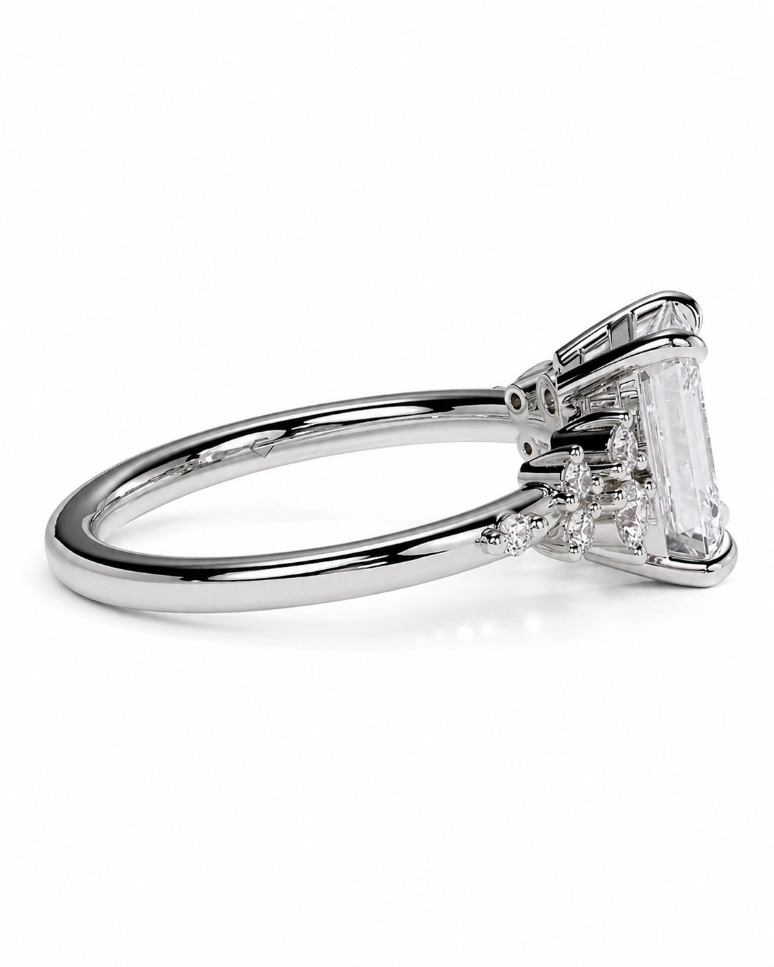 color_925_SIL,color_935_ARG,color_10K_WG, color_14K_WG &&A silver-toned ring featuring a large rectangular clear gemstone in a prong setting, with smaller accent stones along the band, shown on a plain white background.