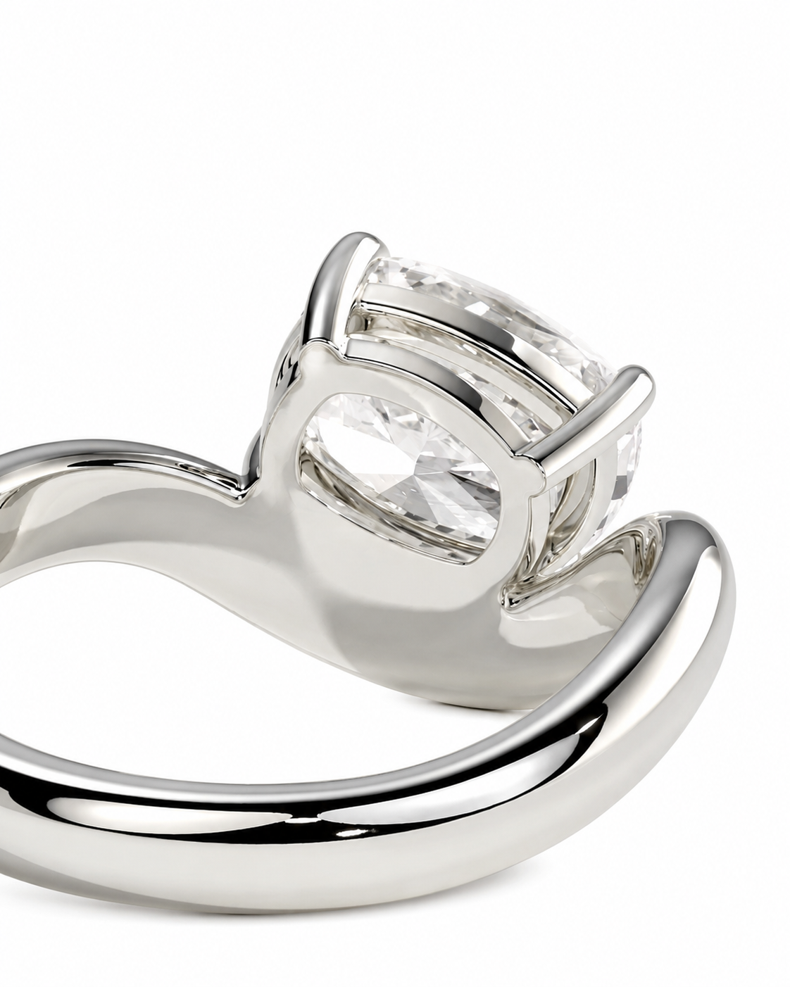 color_925_SIL,color_935_ARG,color_10K_WG, color_14K_WG &&A close-up studio shot of a polished silver-tone ring with a large clear marquise-cut gemstone in a prong setting, shown against a plain white background.