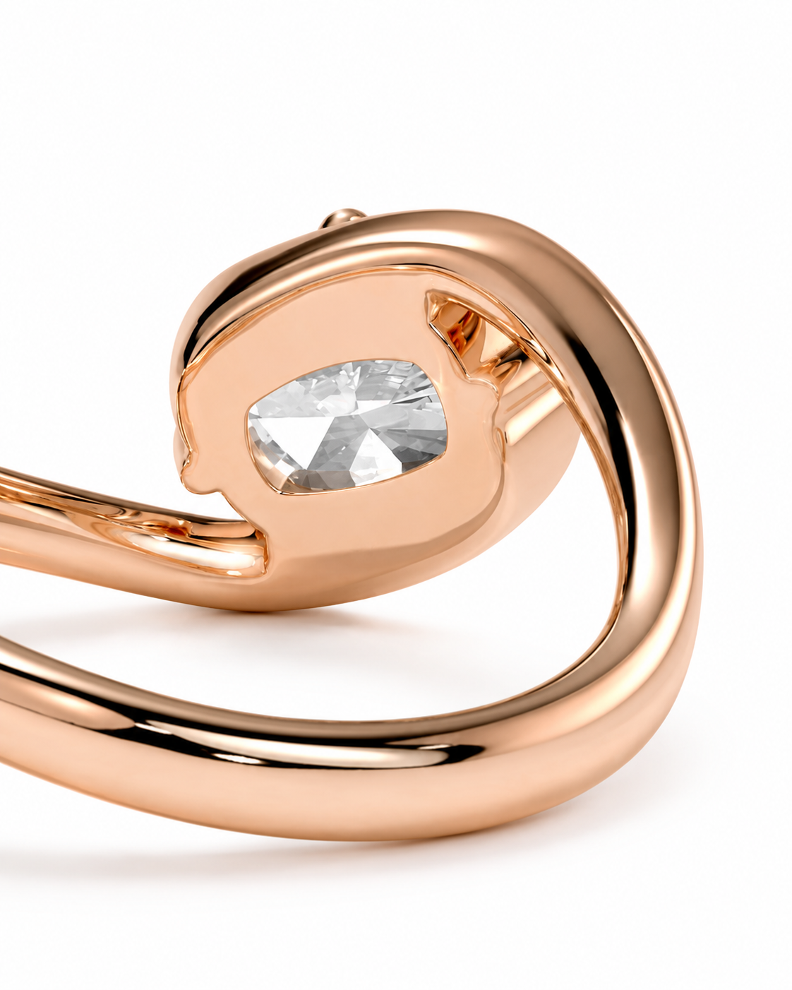 color_10K_RG, color_14K_RG &&A close-up of a polished rose gold ring featuring a marquise-cut clear gemstone in a prong setting, set against a clean white background.