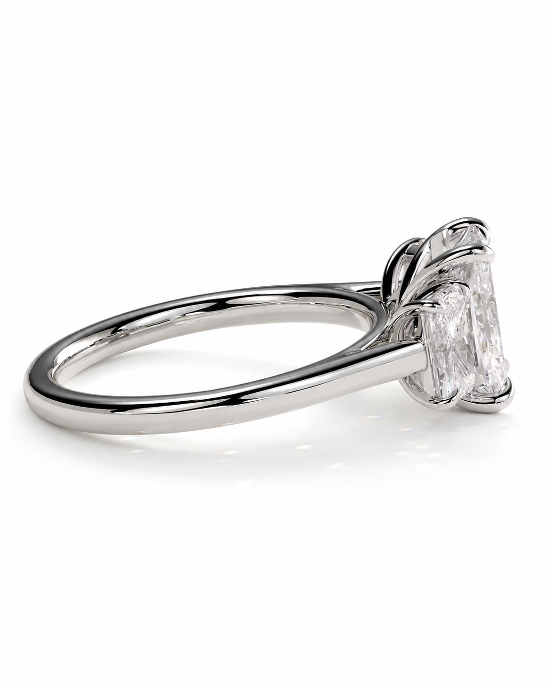 color_925_SIL,color_935_ARG,color_10K_WG, color_14K_WG &&A silver-toned ring featuring a large, clear rectangular emerald-cut gemstone in a prong setting, shown on a clean white background.