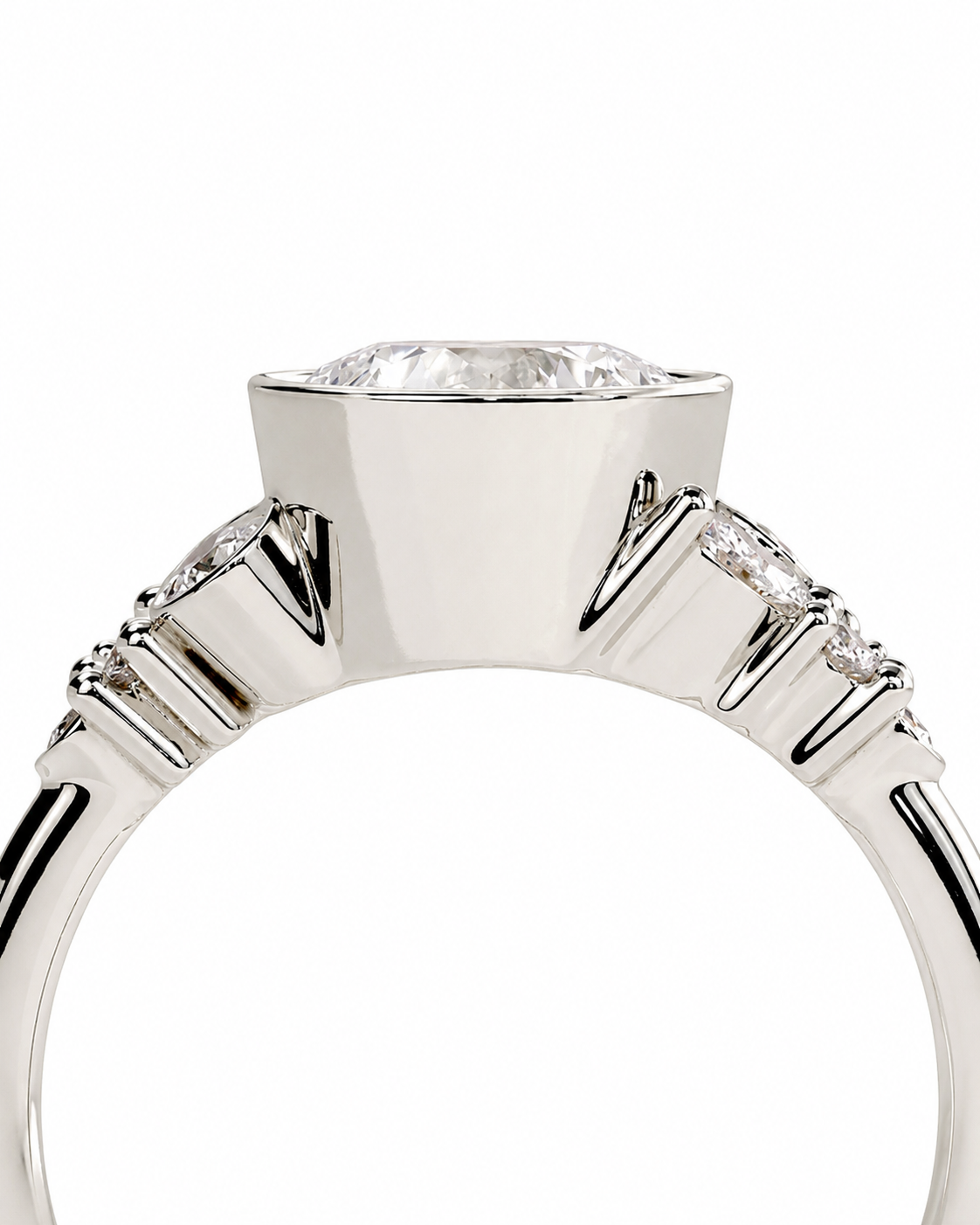 color_925_SIL,color_935_ARG,color_10K_WG, color_14K_WG &&A close-up studio shot of a silver-toned ring featuring a large clear faceted center stone and smaller side stones, shown against a plain white background.