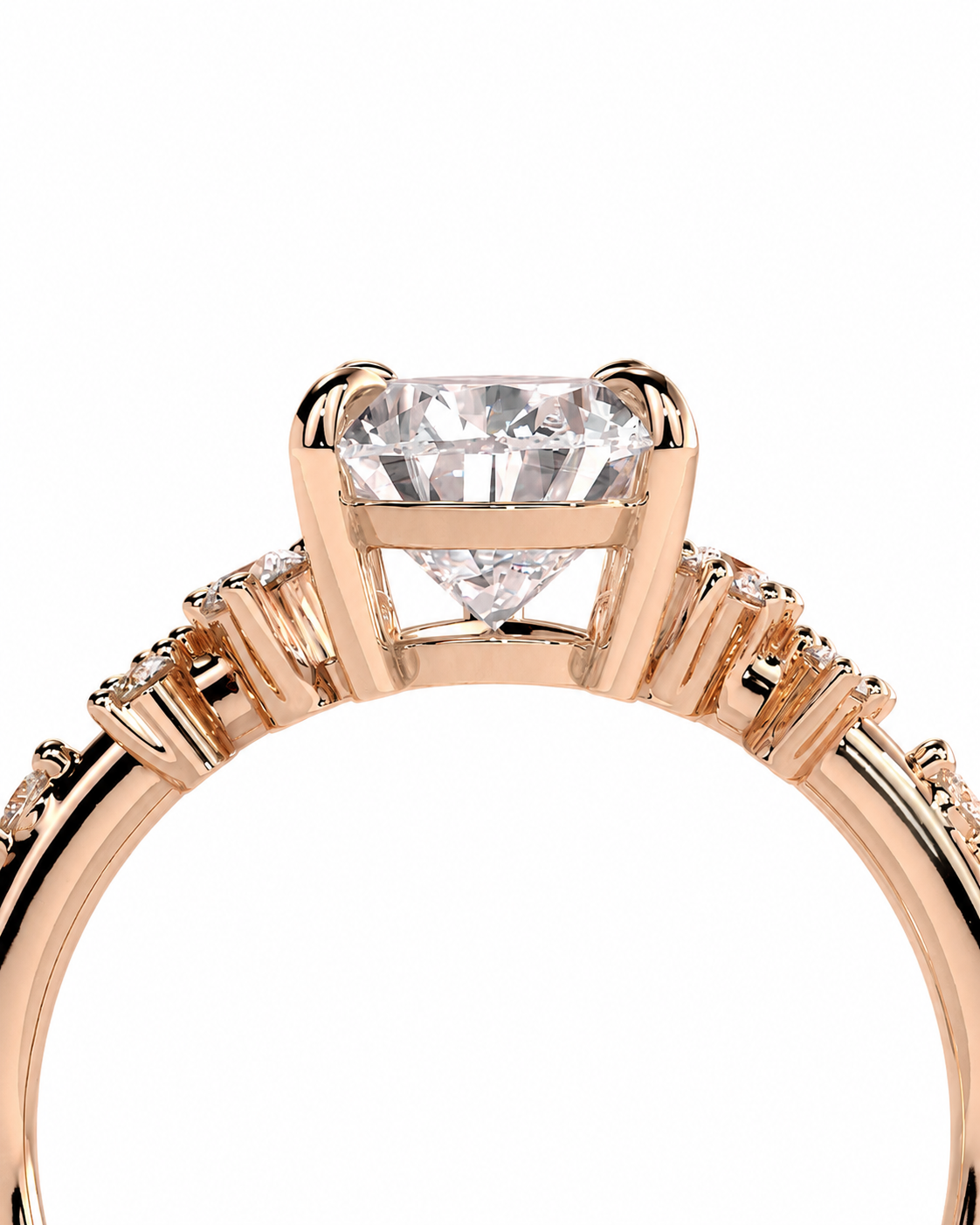 color_10K_RG, color_14K_RG &&Rose gold diamond ring with a large round brilliant-cut center stone and smaller diamonds along the band, shown against a plain white background.